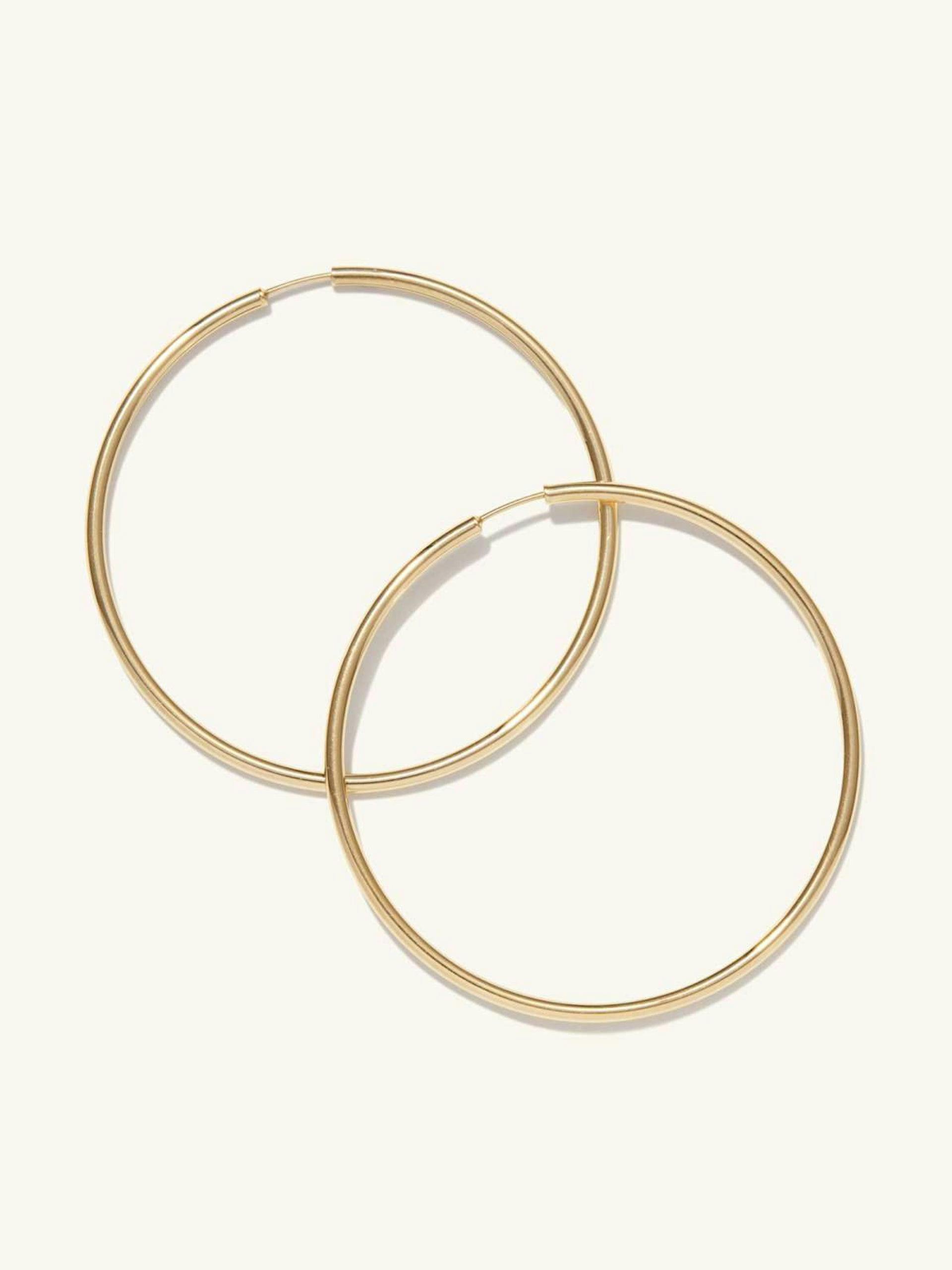 Gold oversized thin hoops