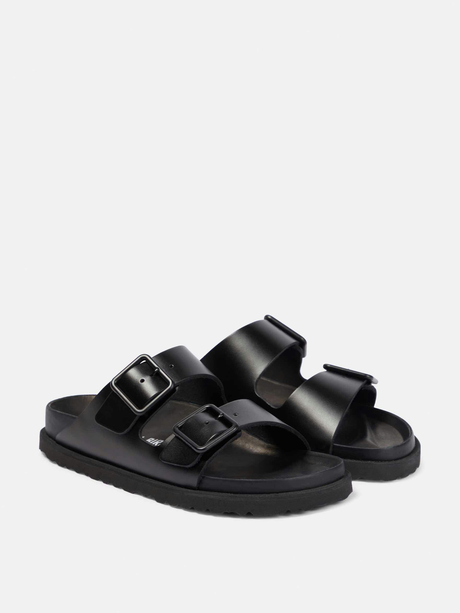 Black buckle leather sandals