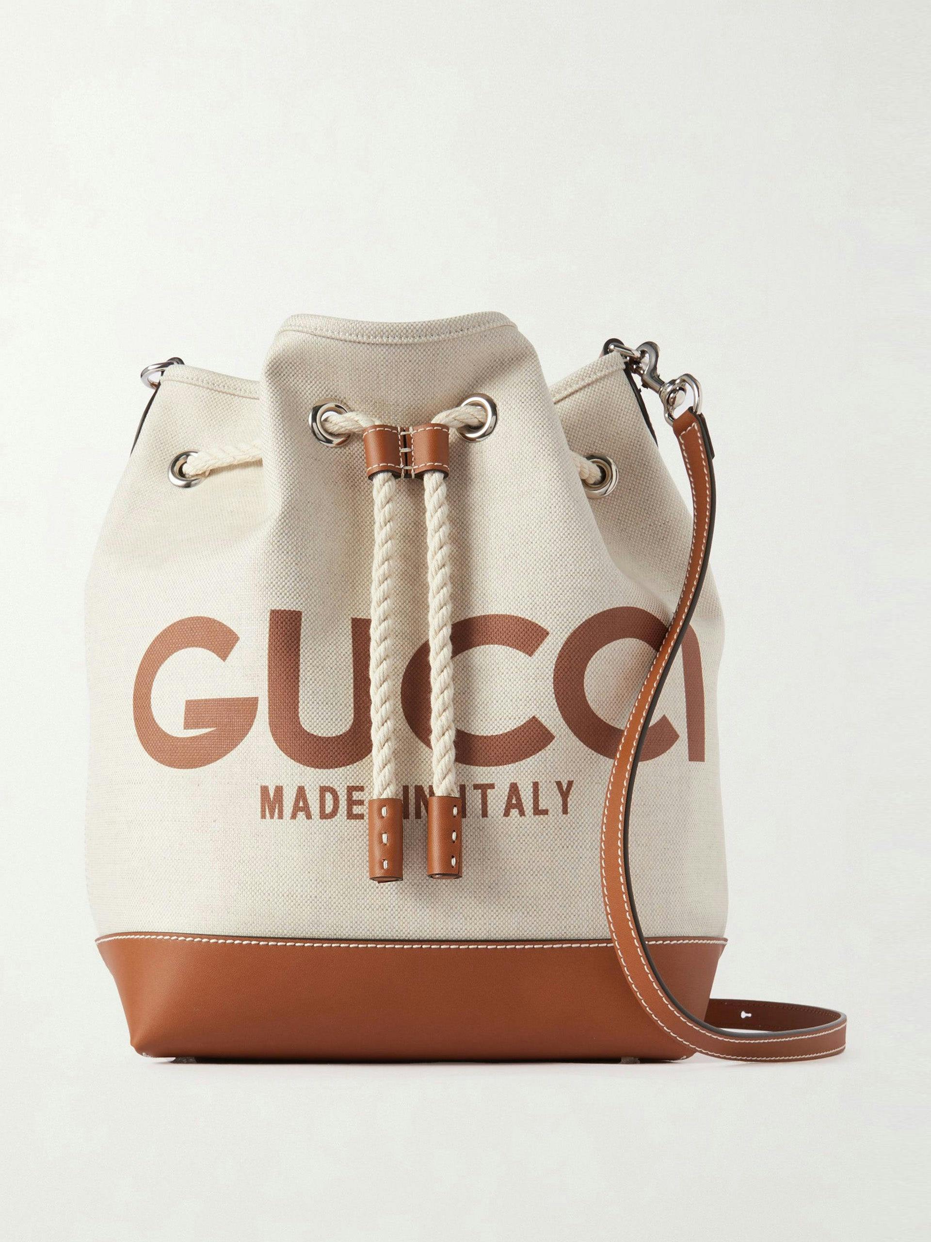 Leather-trimmed printed canvas bucket bag