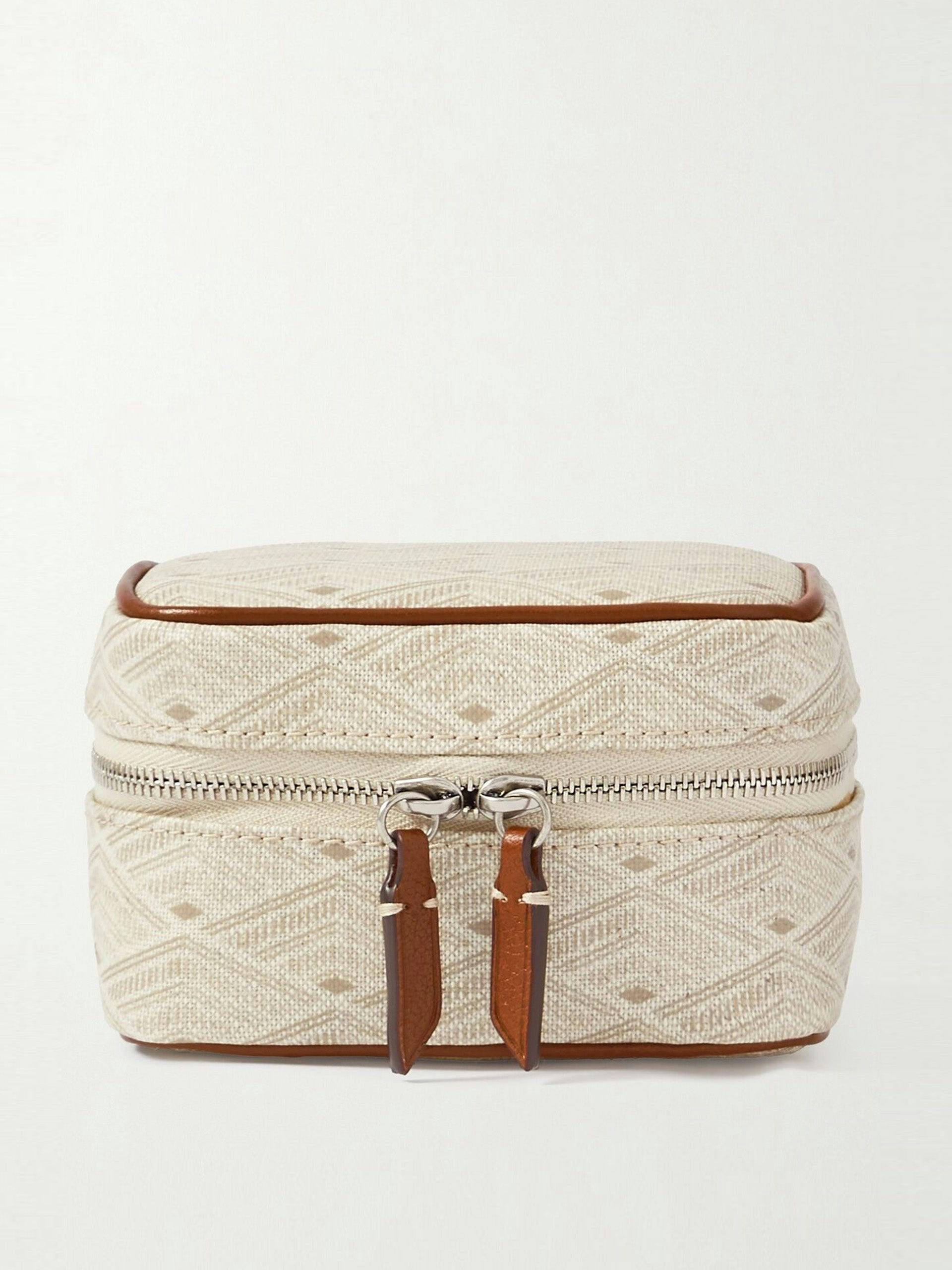 Leather-trimmed printed canvas travel case