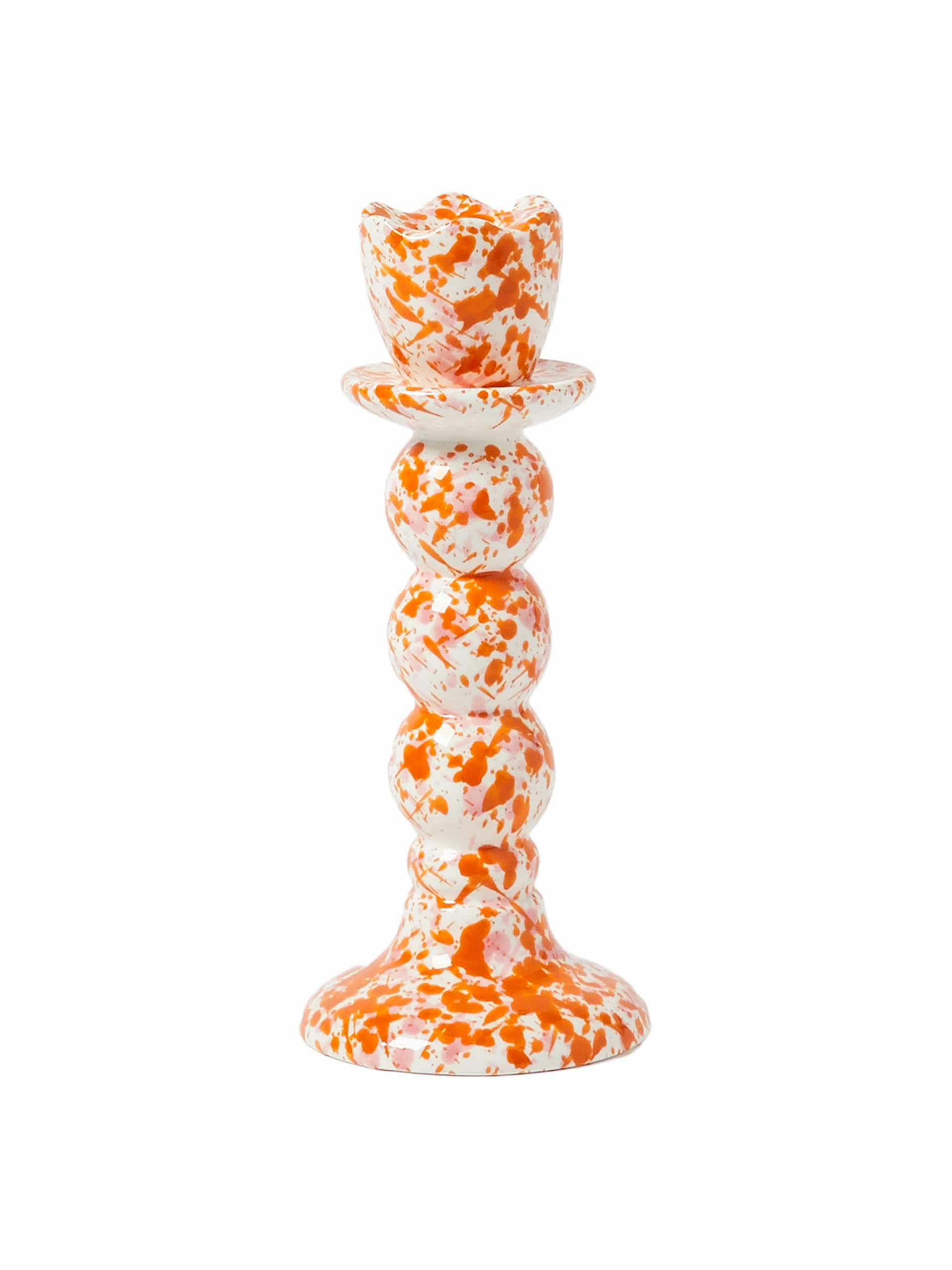 Splatter orange ceramic candlestick holder
