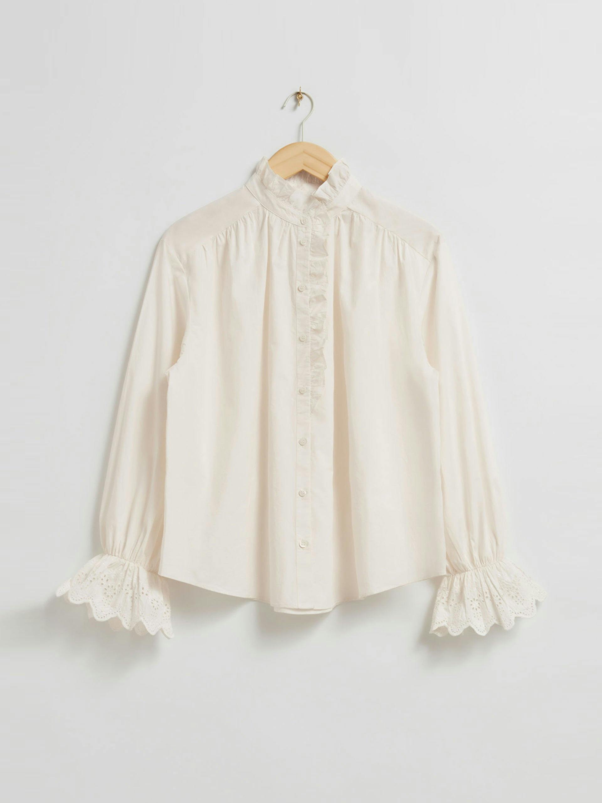 Ivory embroidered blouse