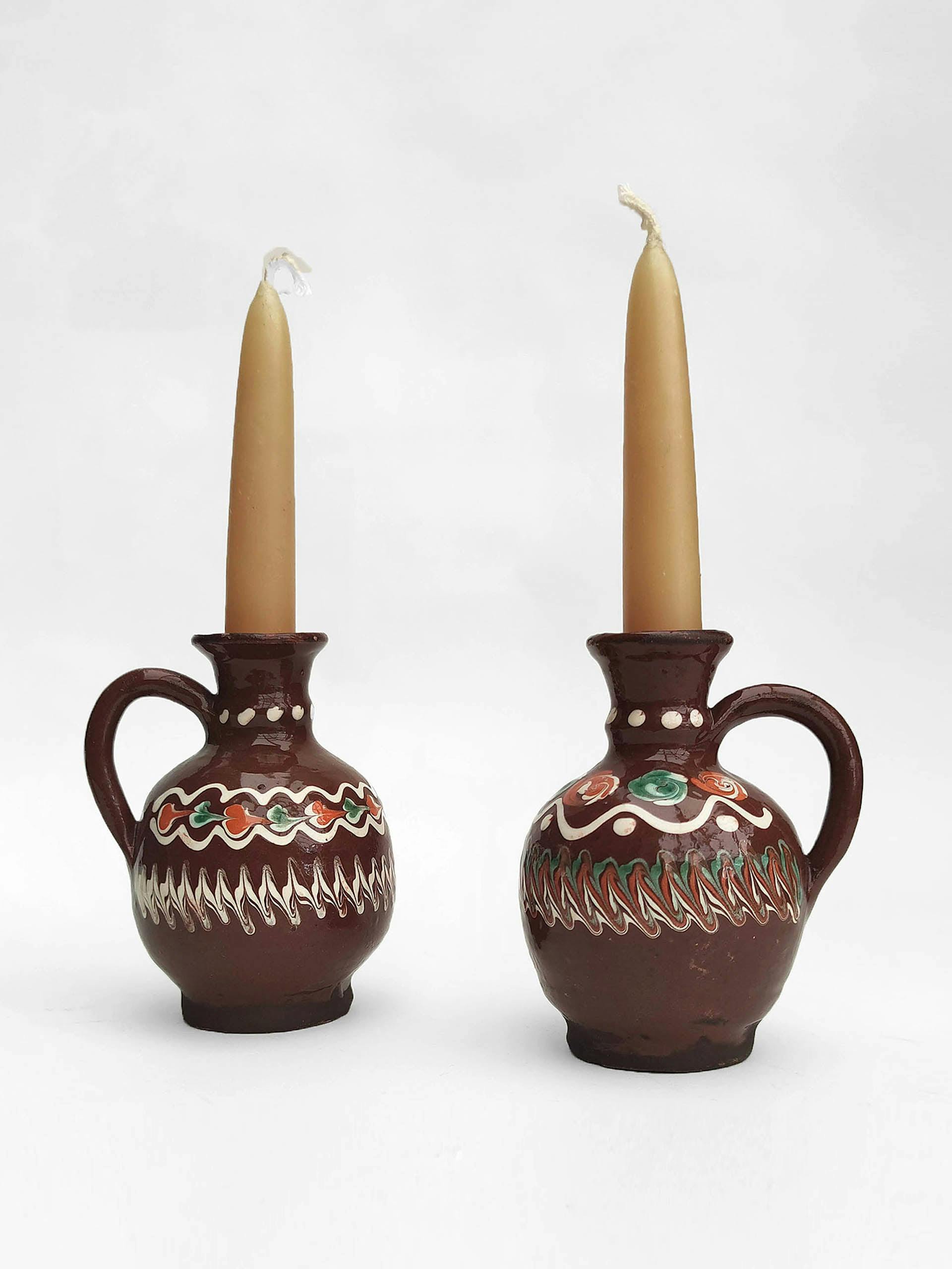 Brown ceramic candlestick holder