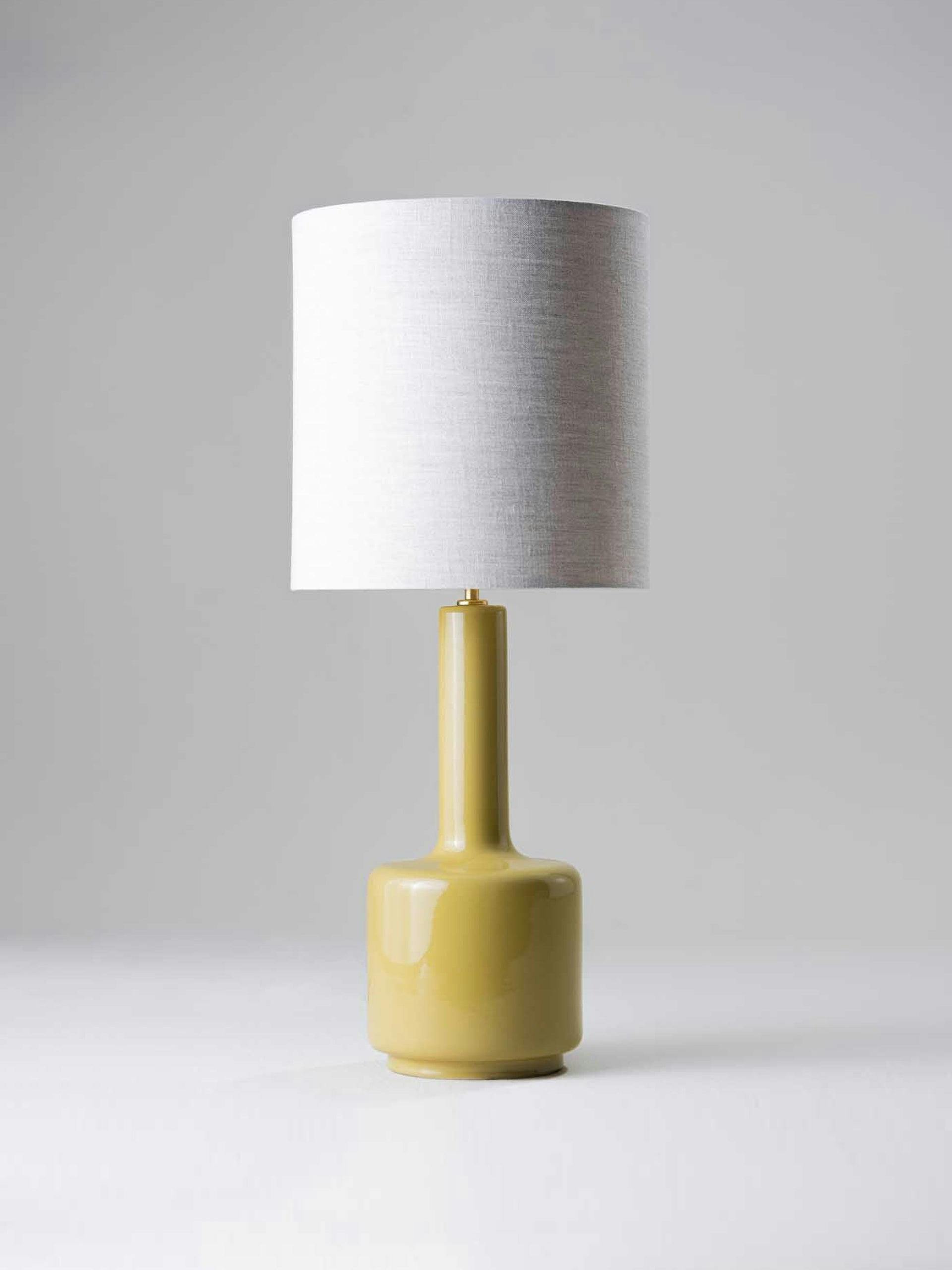 Yellow table lamp with linen shade