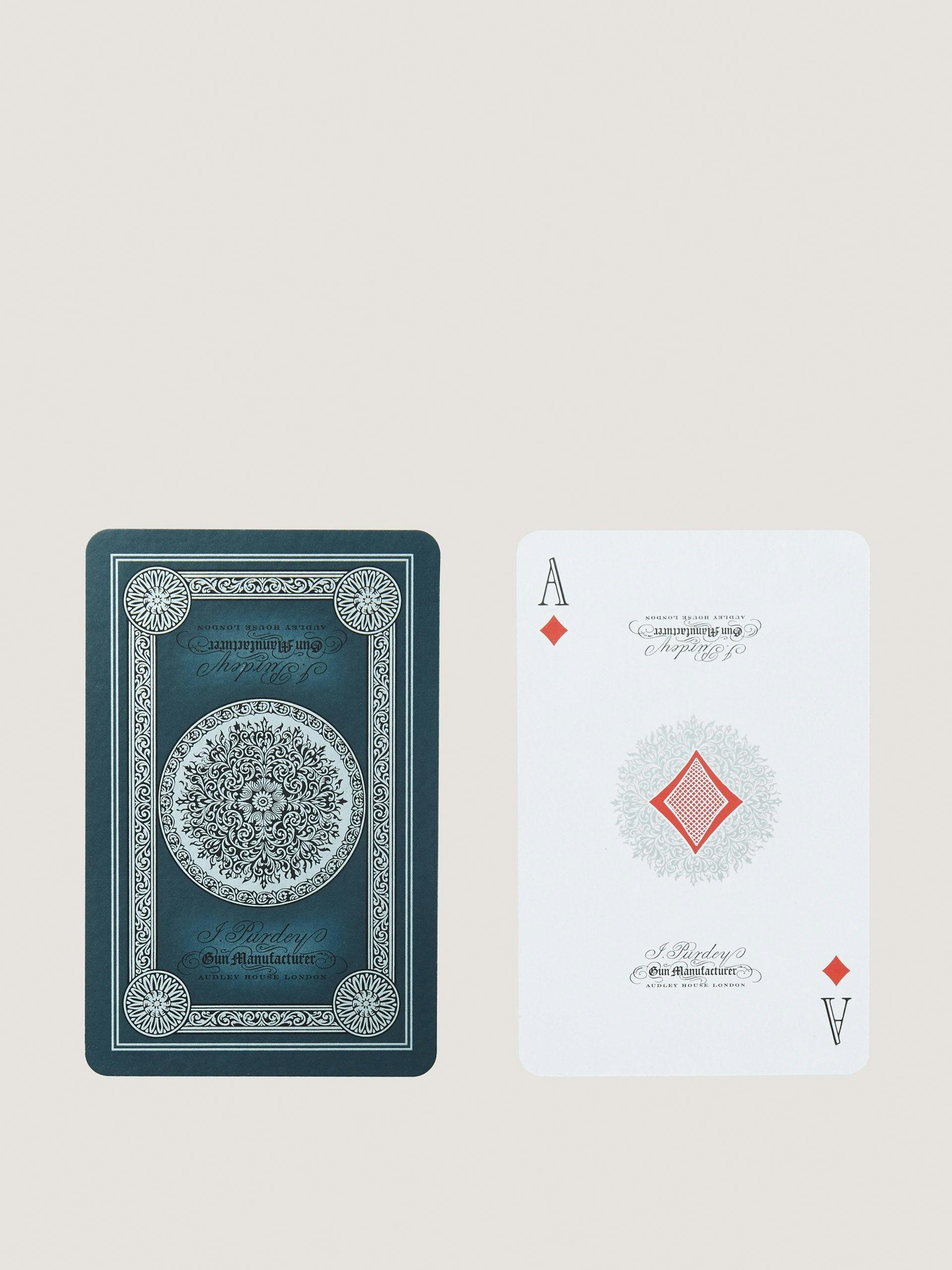 Engraved playing cards in midnight blue