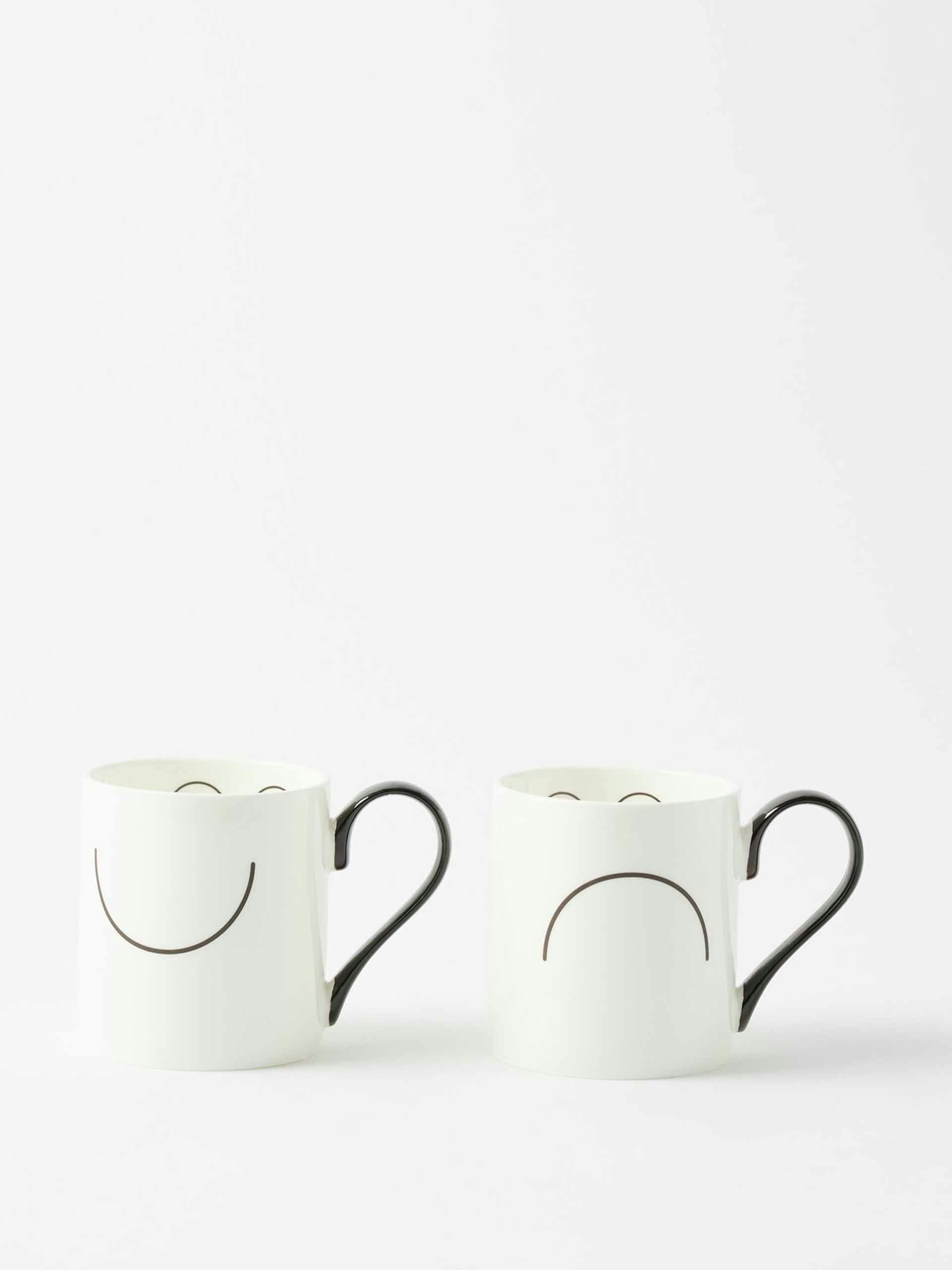 Happy & Sad Eyes bone-china tea cups (set of 2)