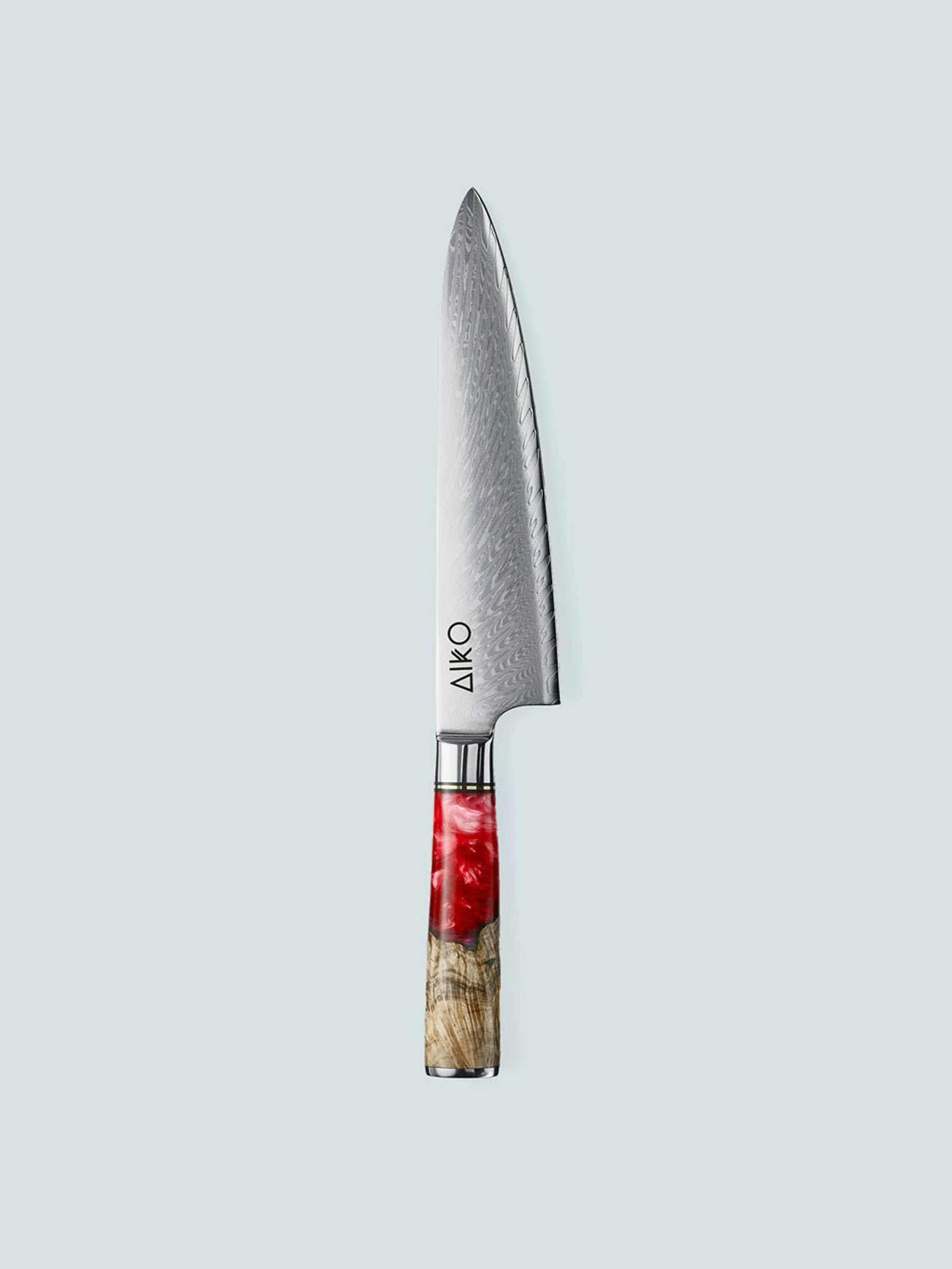Steel knife with red handle