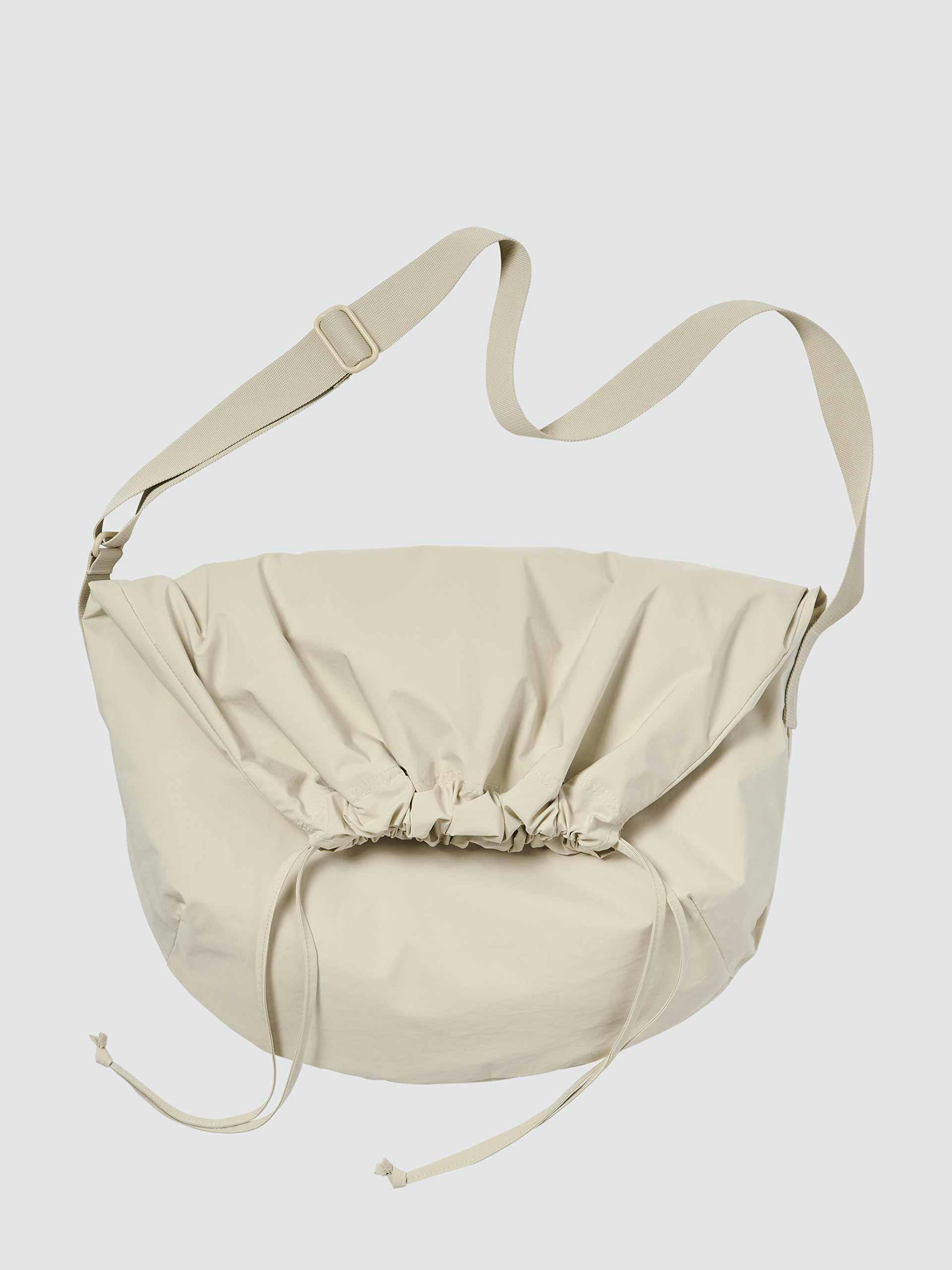 White drawstring shoulder bag