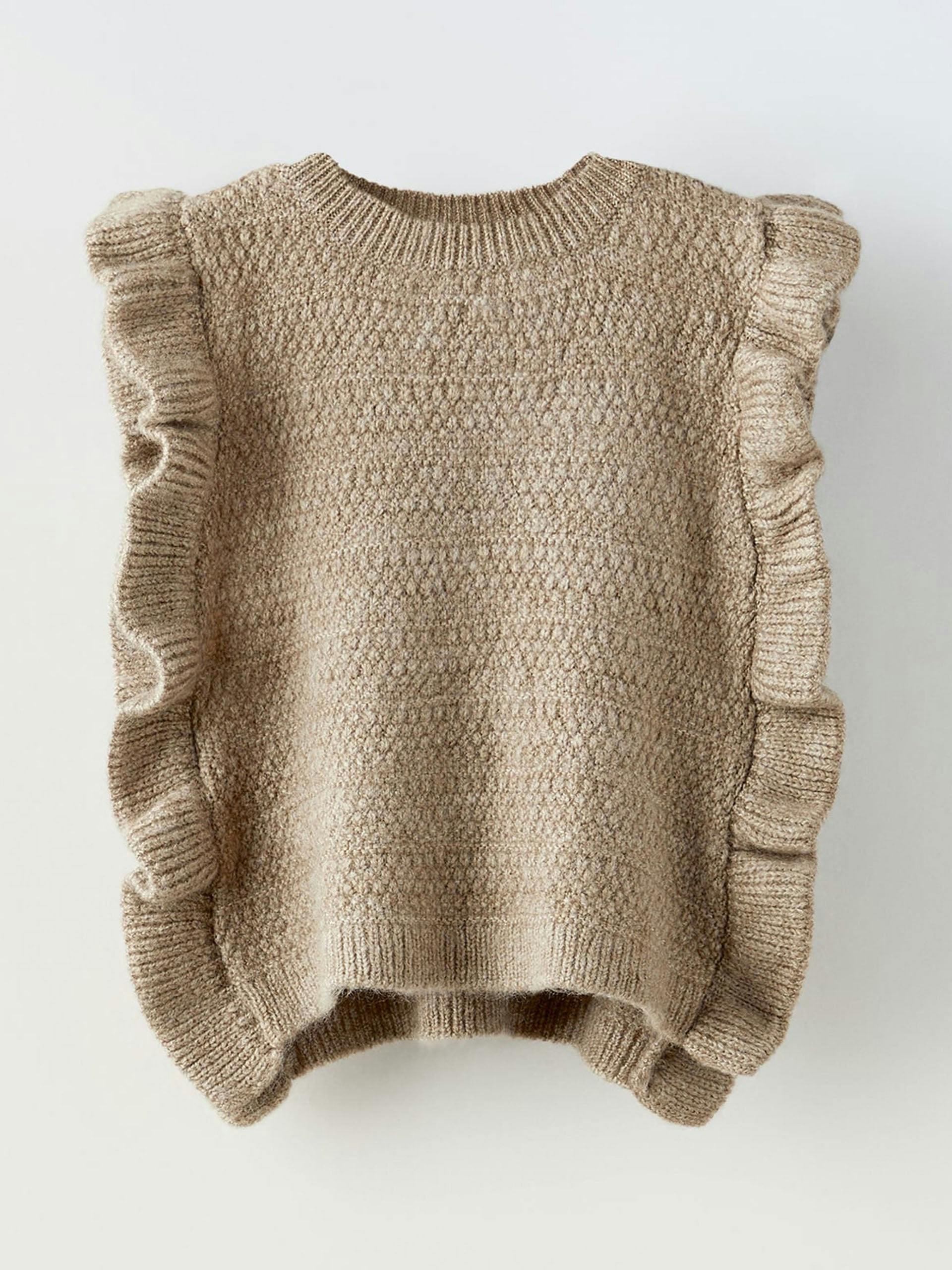 Ruffled knit bib