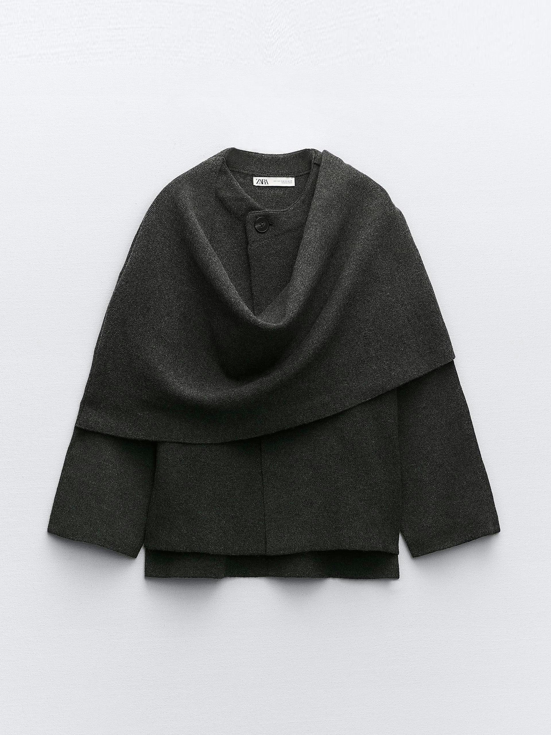 Short knit grey coat with asymmetric scarf