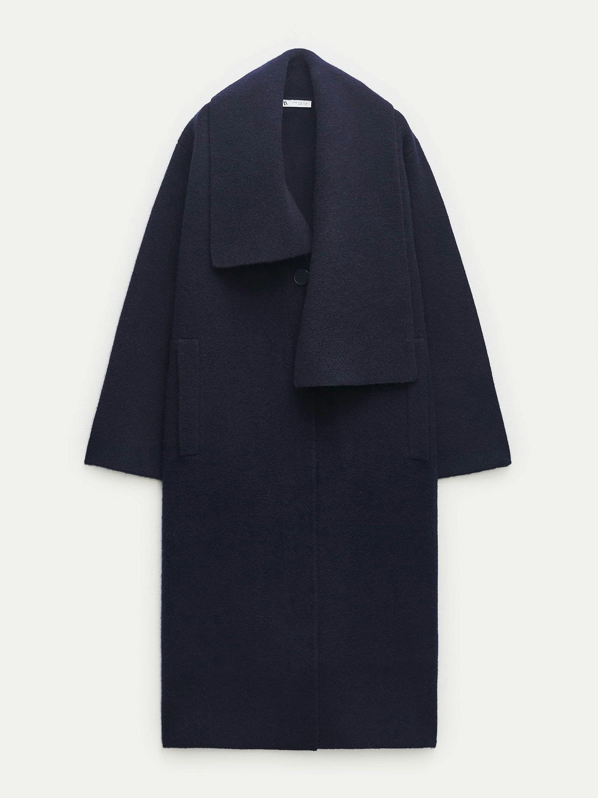 Wool coat with asymmetric lapel collar