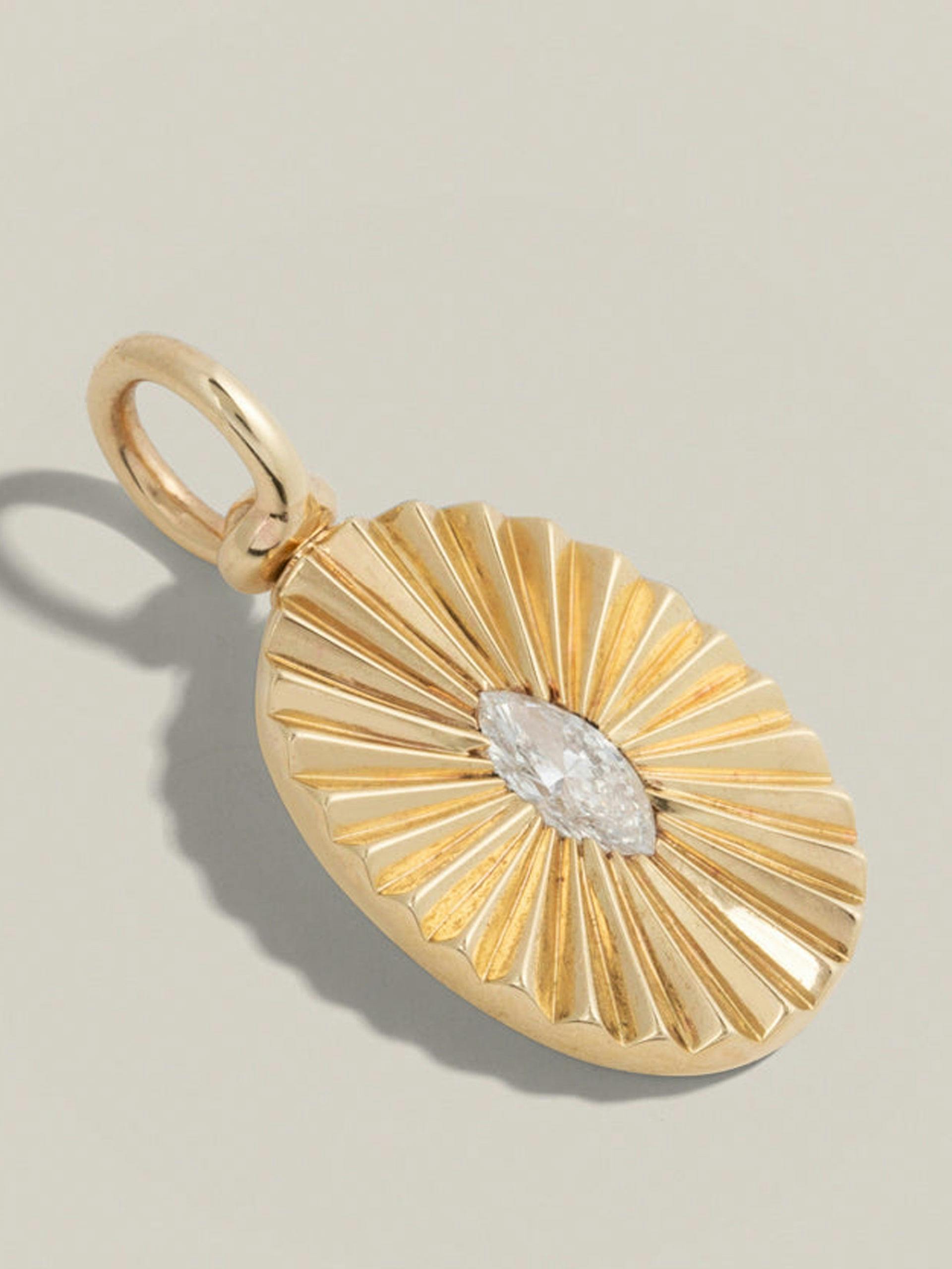 Sunray gold and diamond pendant