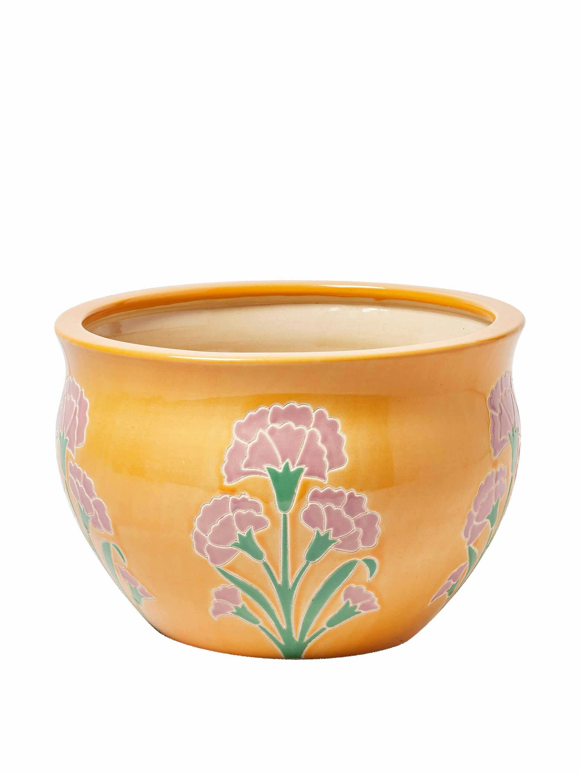 Yellow ceramic outdoor plant pot