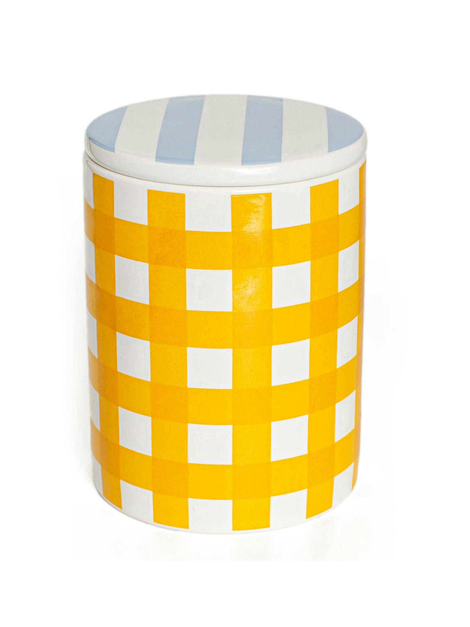Scented candle in ceramic striped pot with lid
