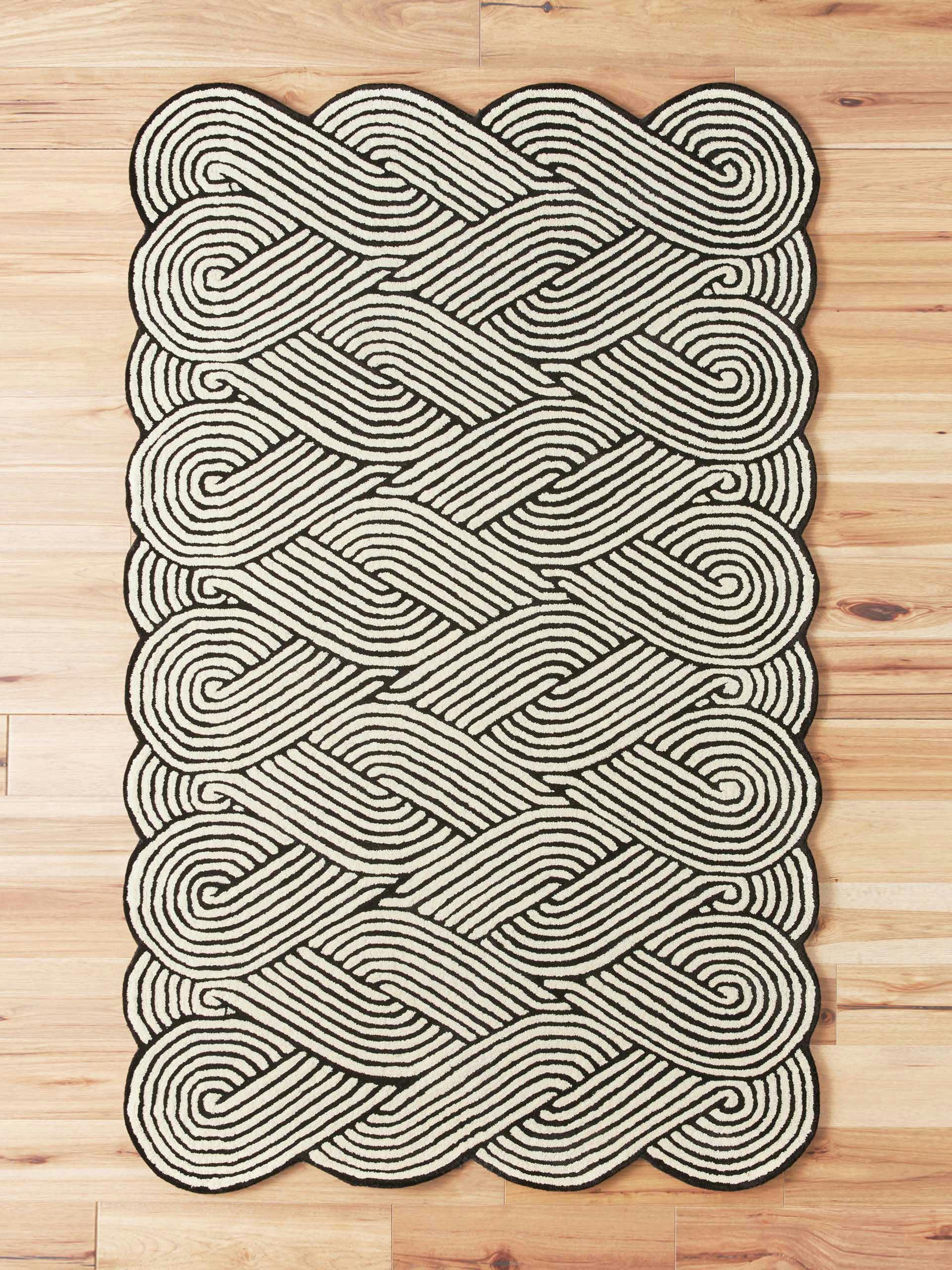 Hand-tufted black and white swirl rug