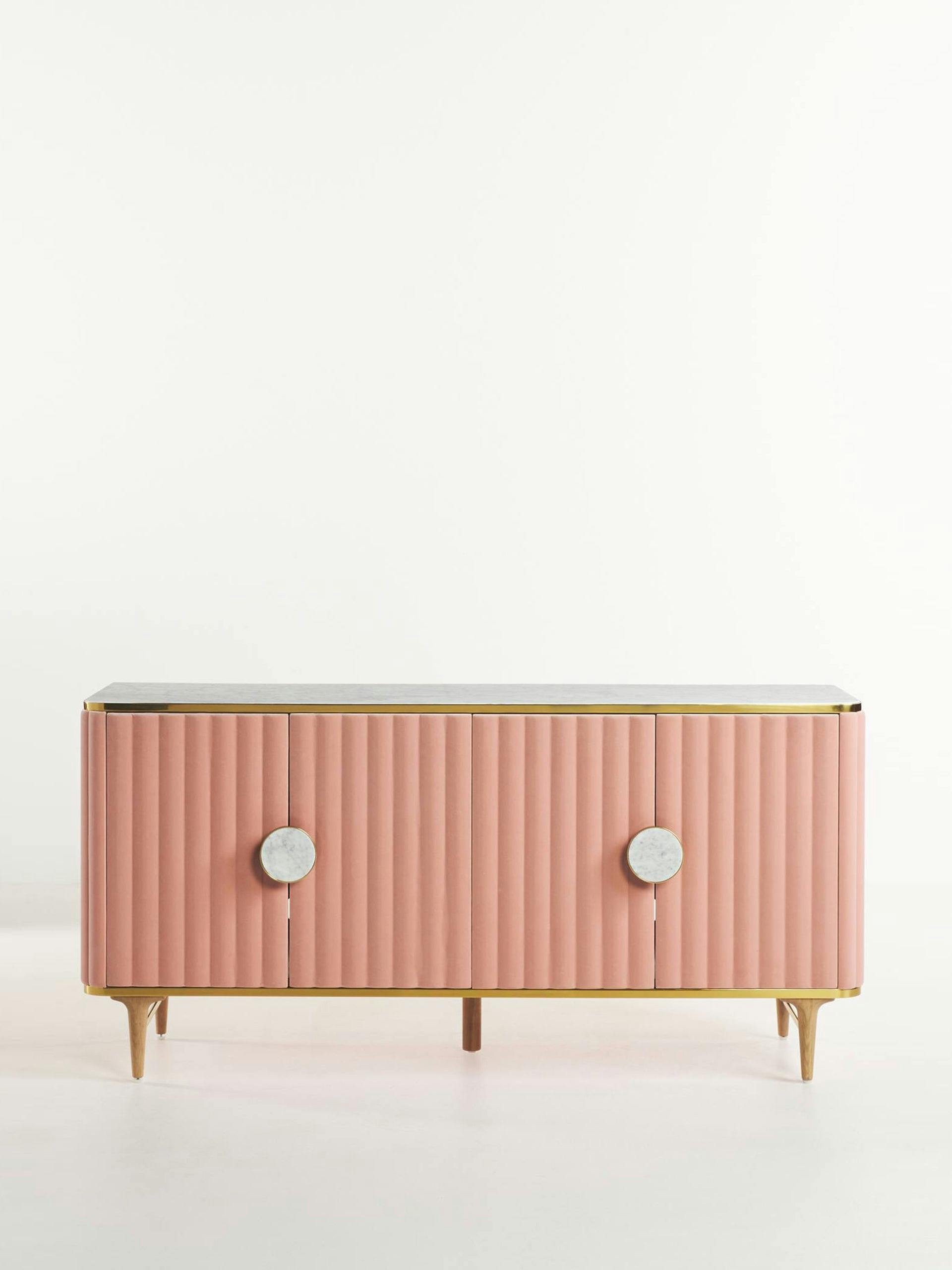 Pink velvet buffet with marble top