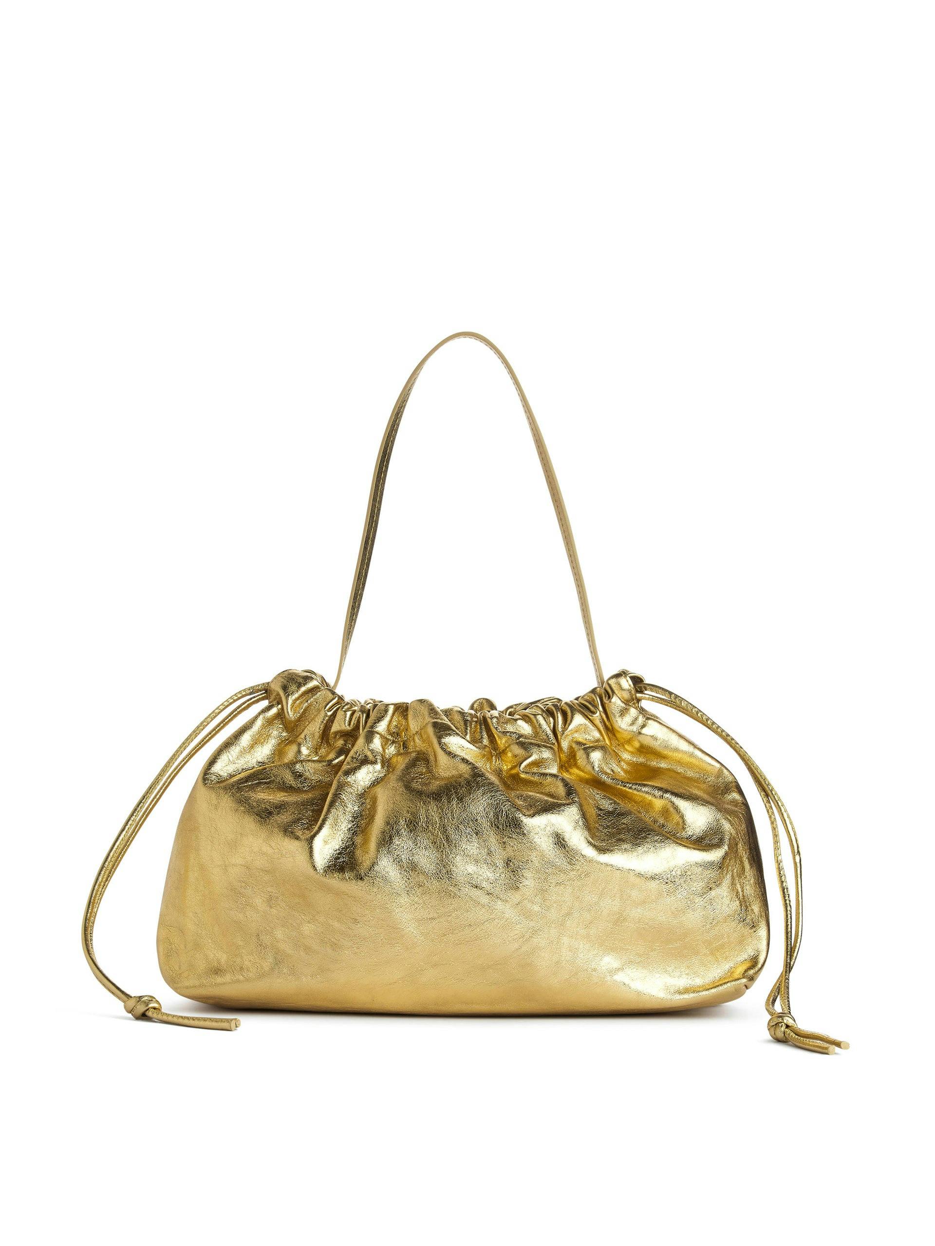 Gold gathered leather bag