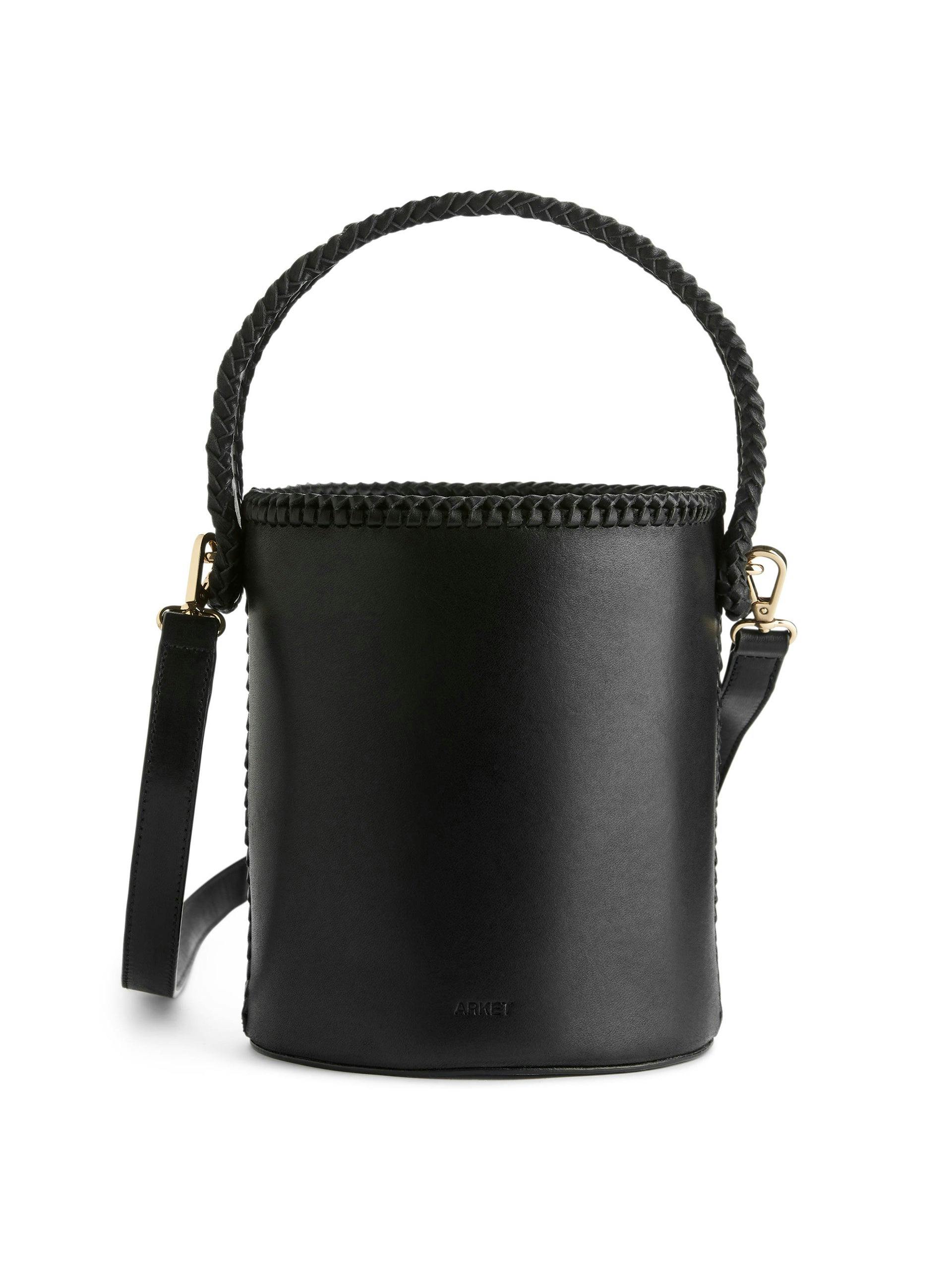 Leather bucket bag with whipstitch detailing
