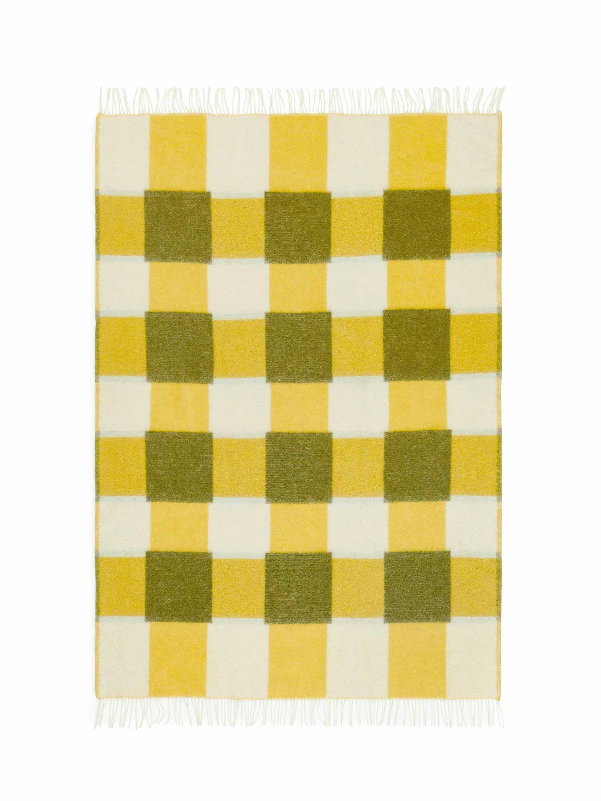 Evelina Kroon yellow checked woven blanket