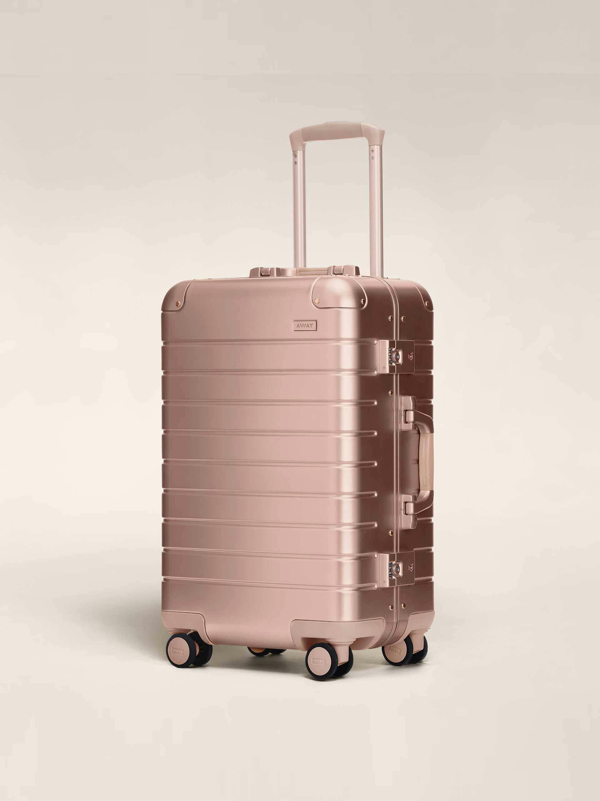 Rose gold aluminium carry on suitcase