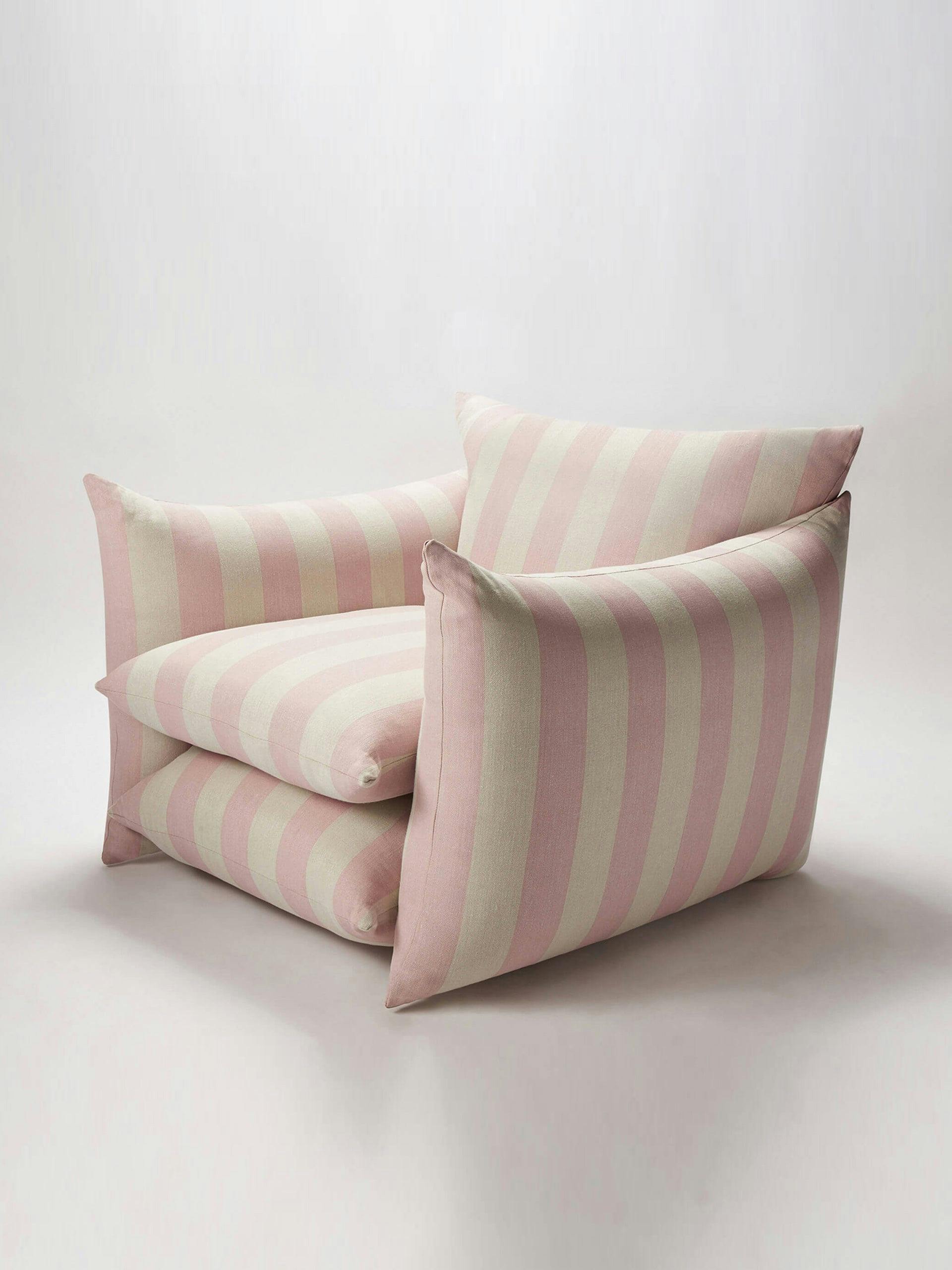 Pink and white striped armchair