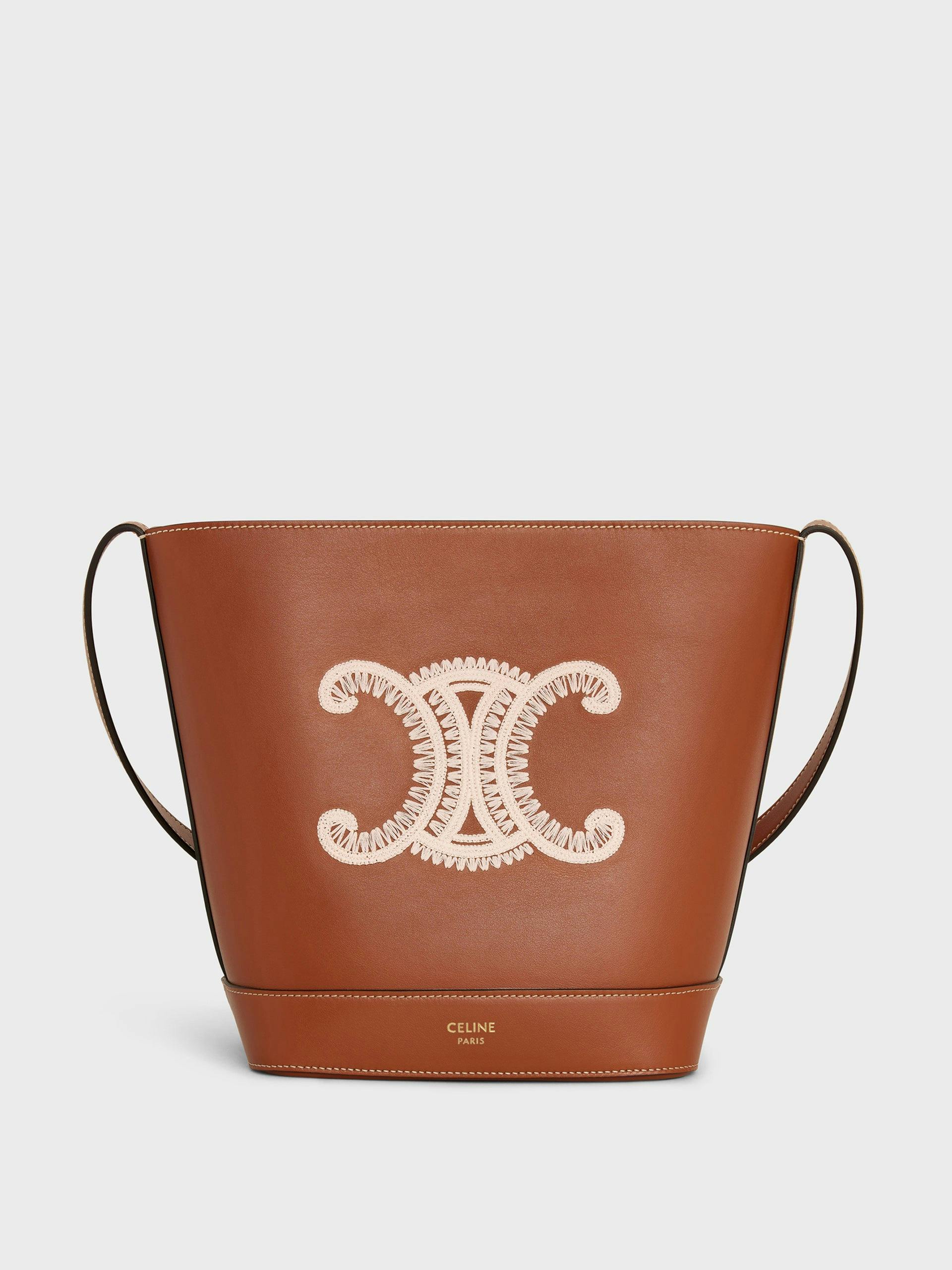 Small calfskin Cuir Triomphe bucket bag with Triomph embroidery