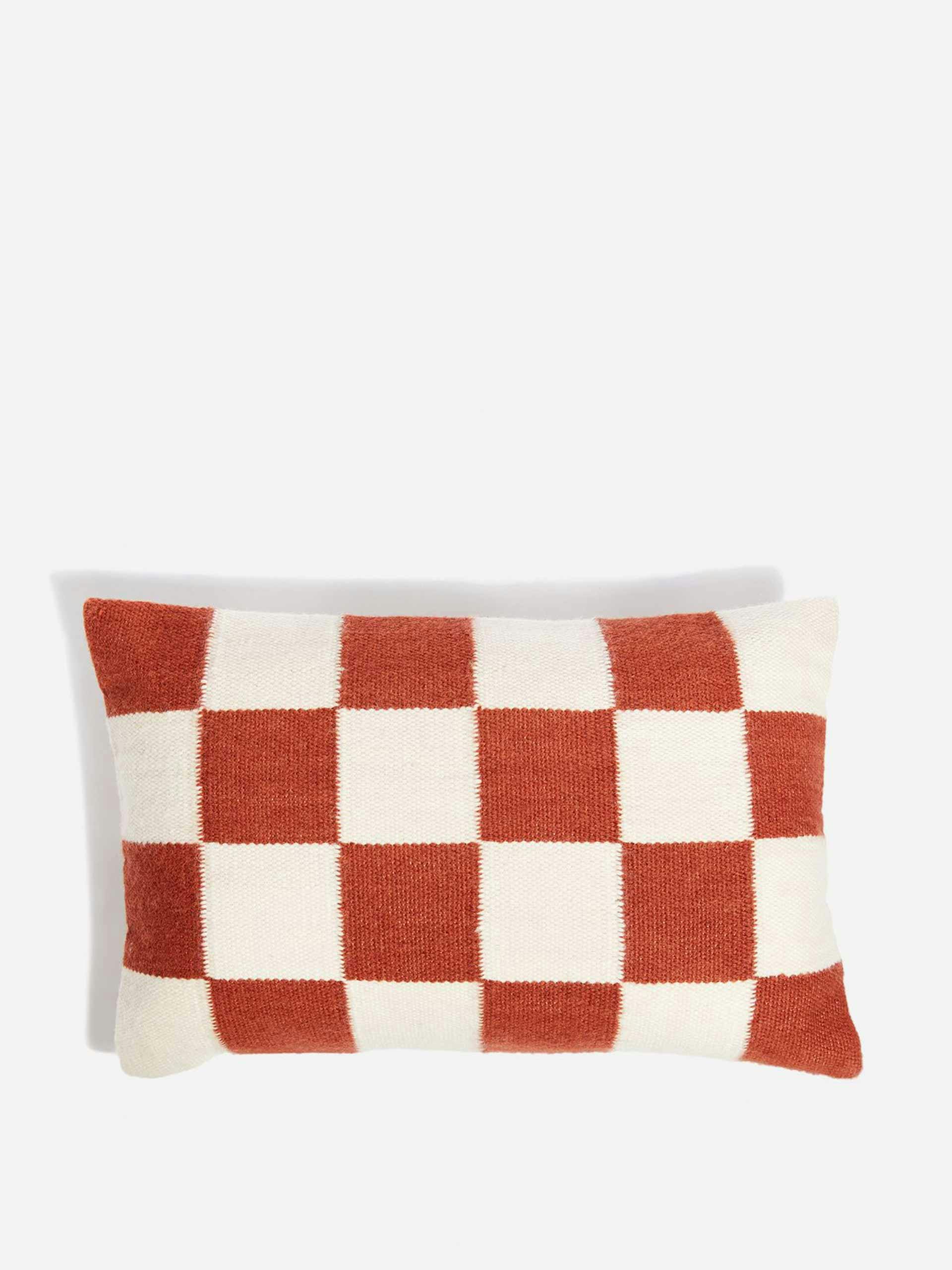 Red and white checked cushion