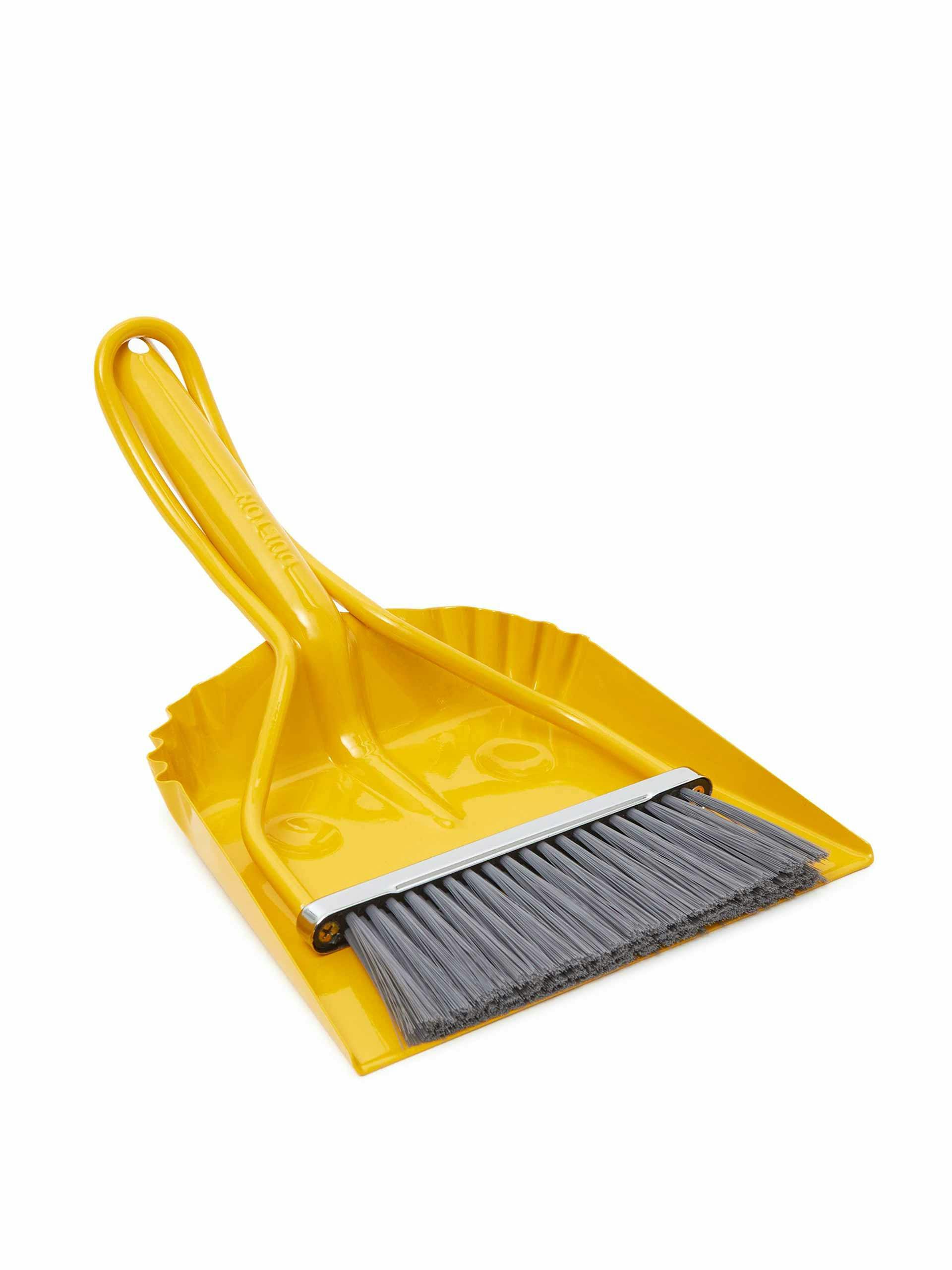 Yellow dustpan and brush