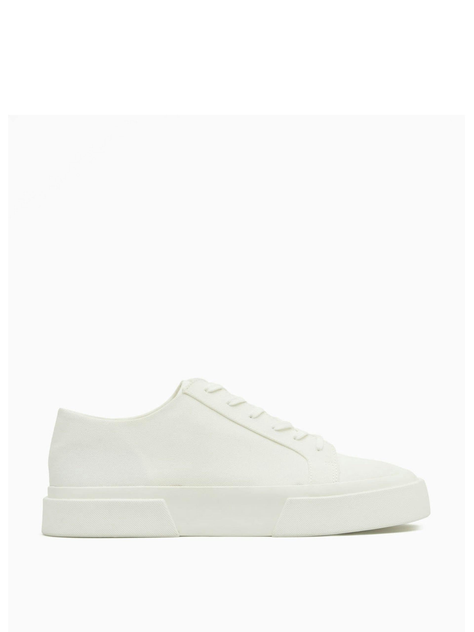 White canvas lace-up trainers