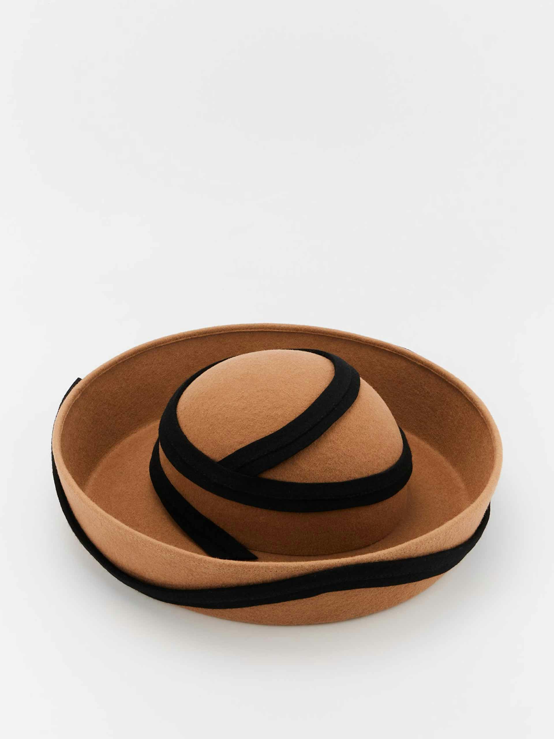 Beige and black felt hat