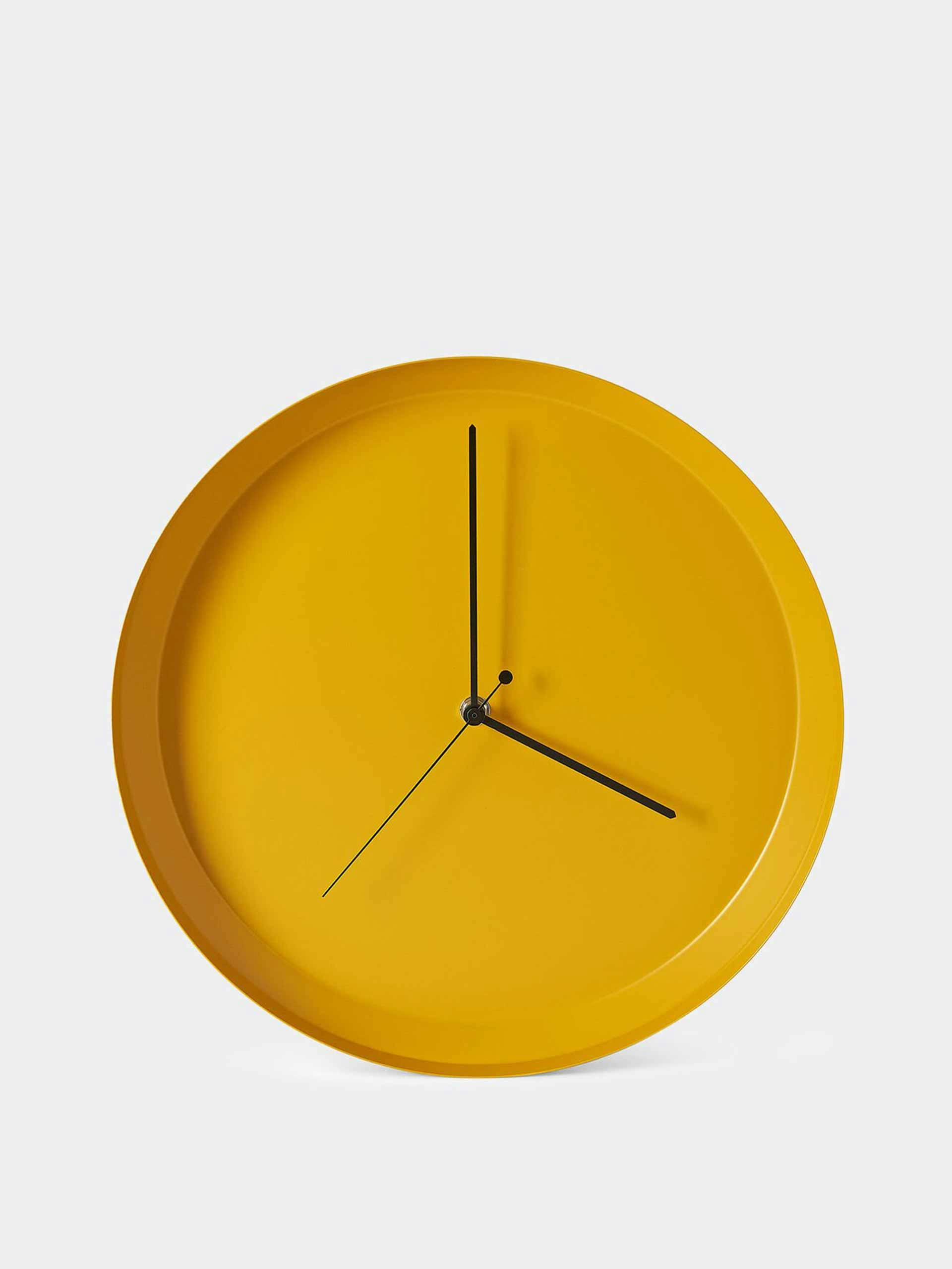 Yellow dish wall clock