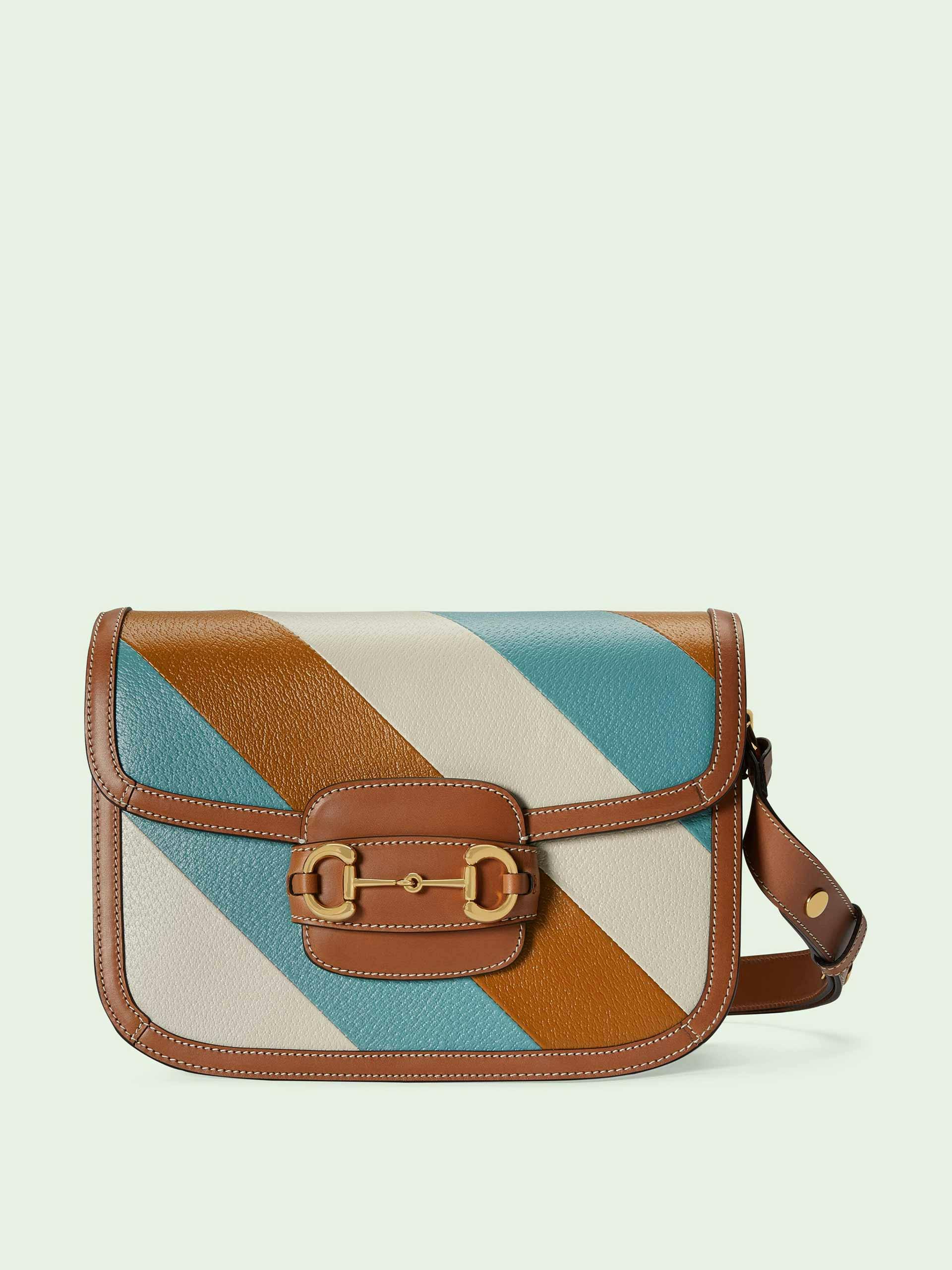 Blue and brown leather handbag