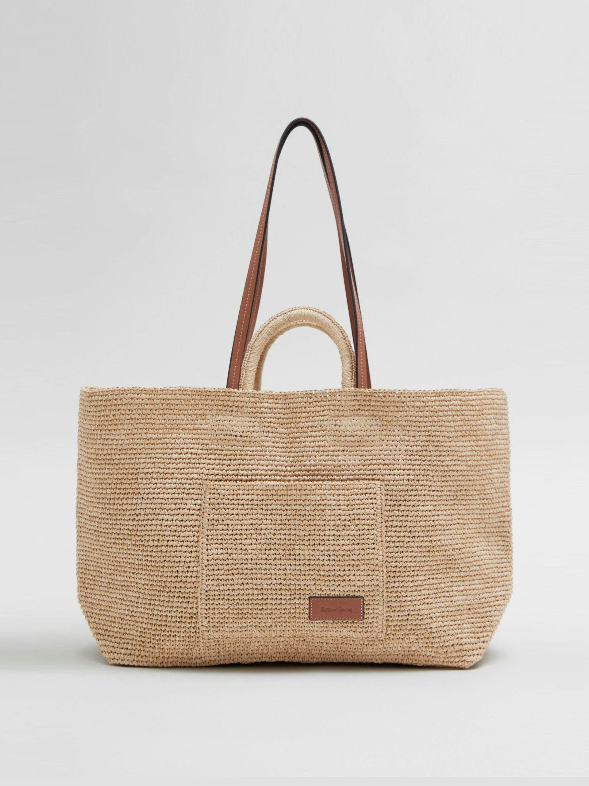 Large woven straw tote bag