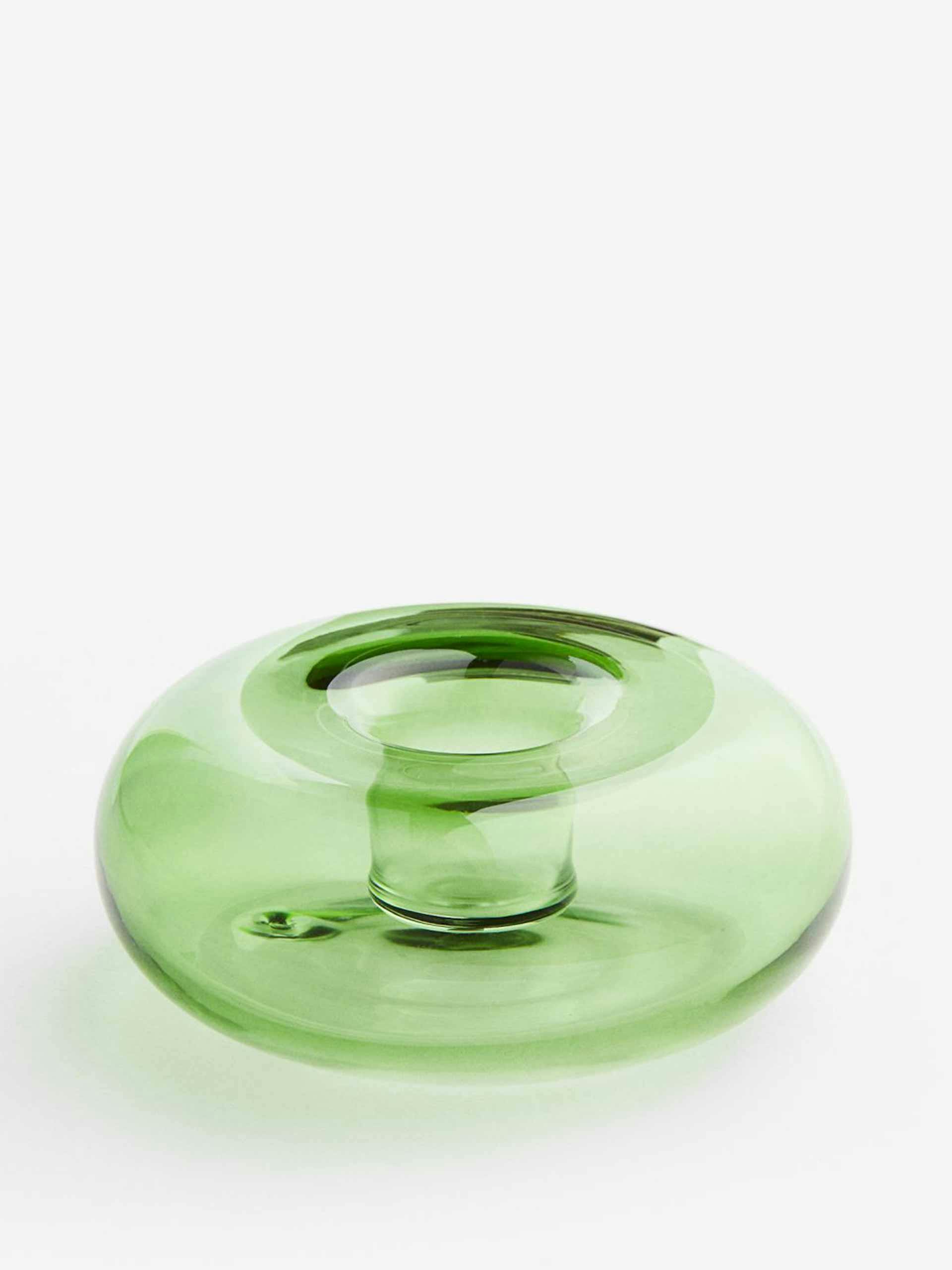 Green glass candlestick holder