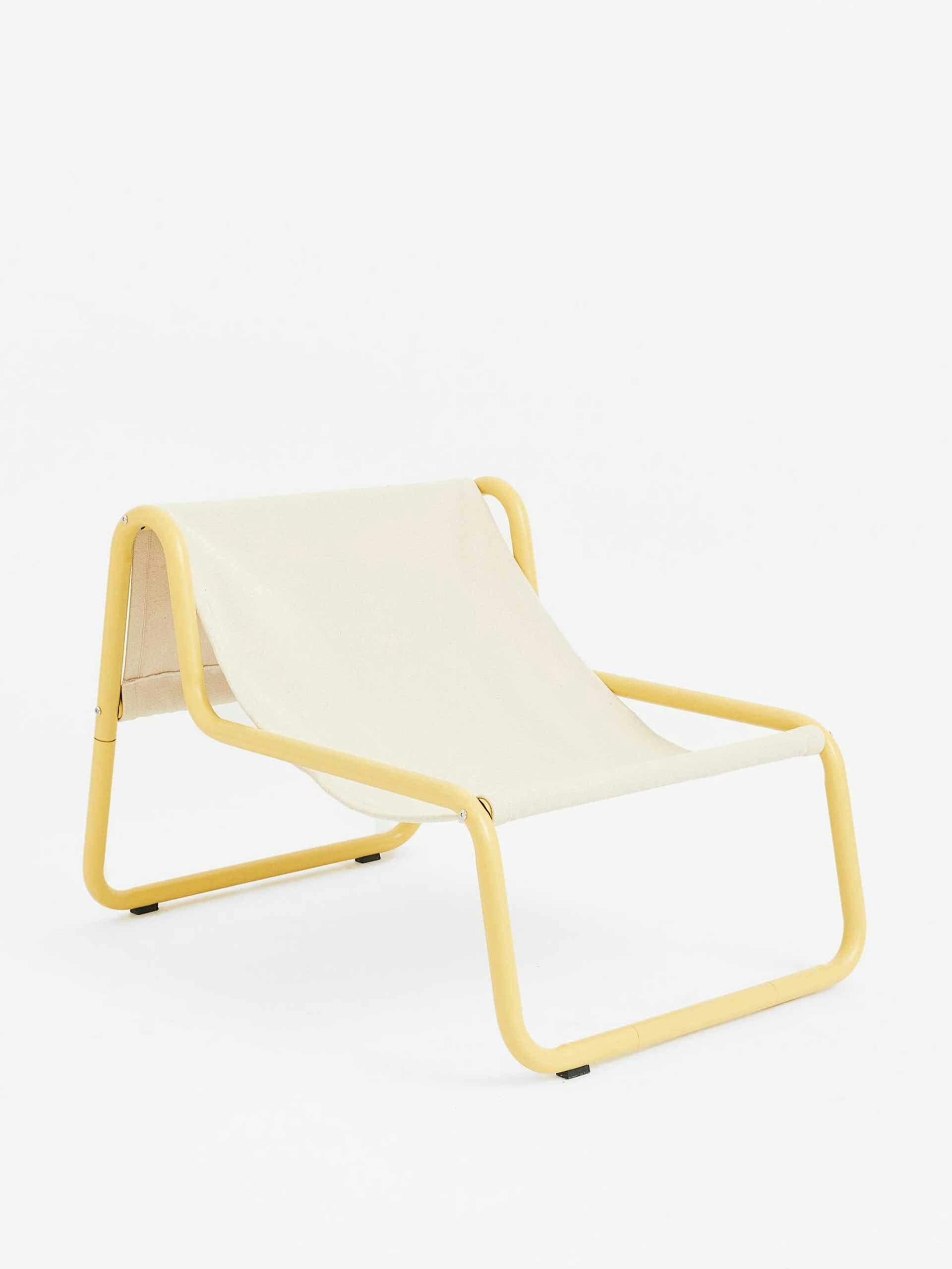 Yellow metal lounge chair