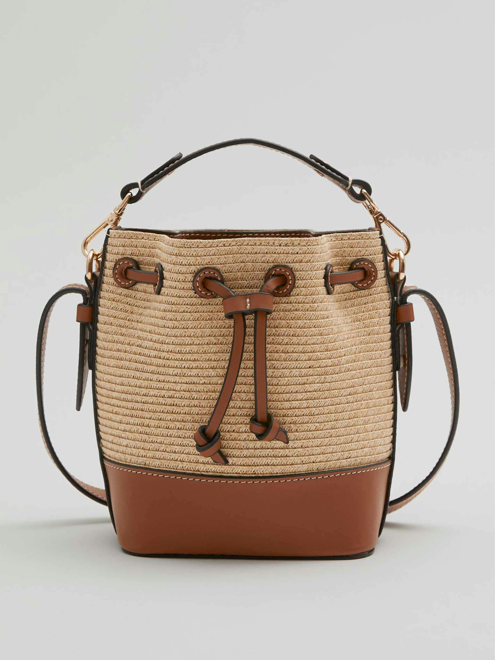 Leather trimmed straw bucket bag