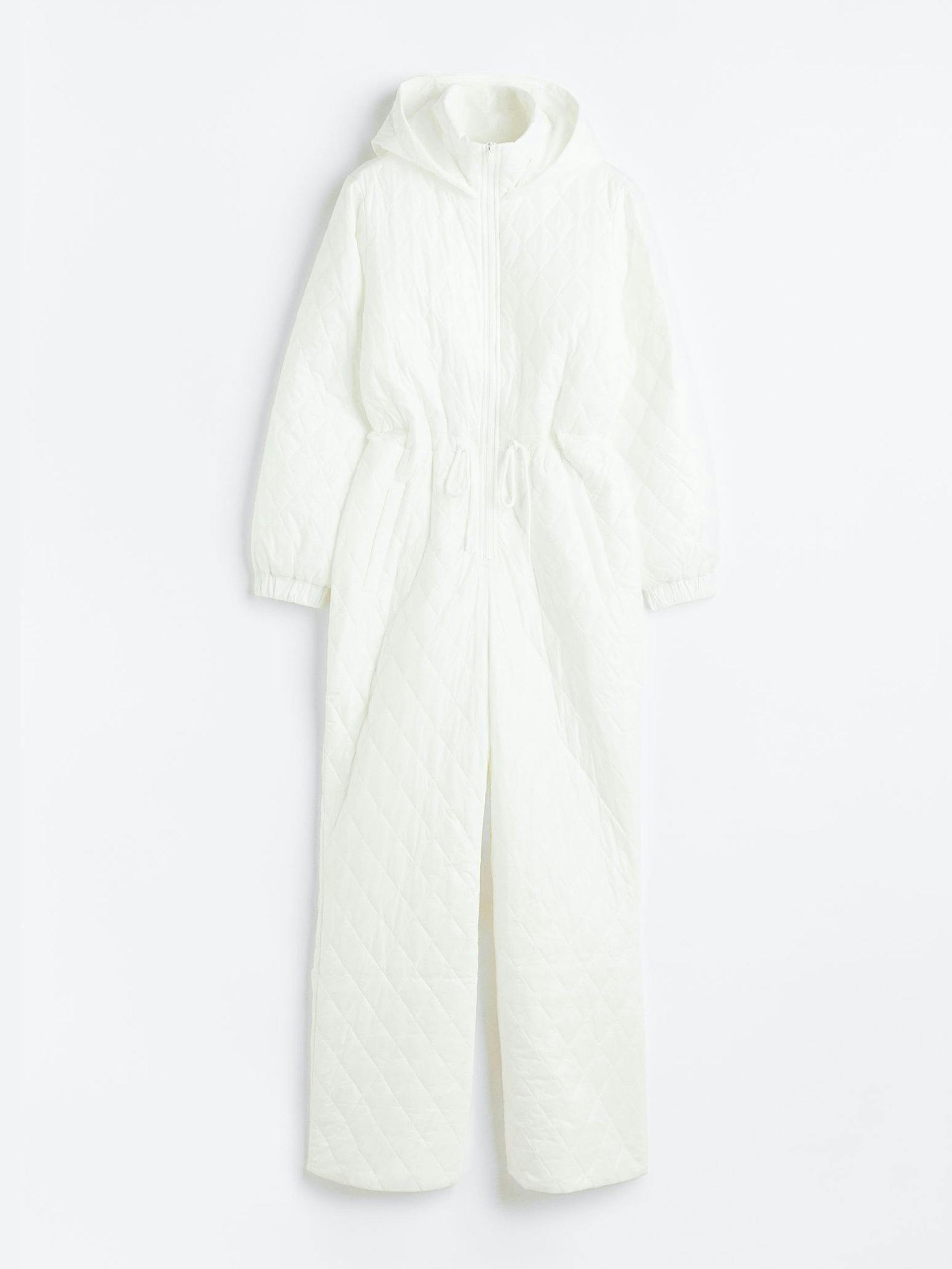 White quilted ski suit