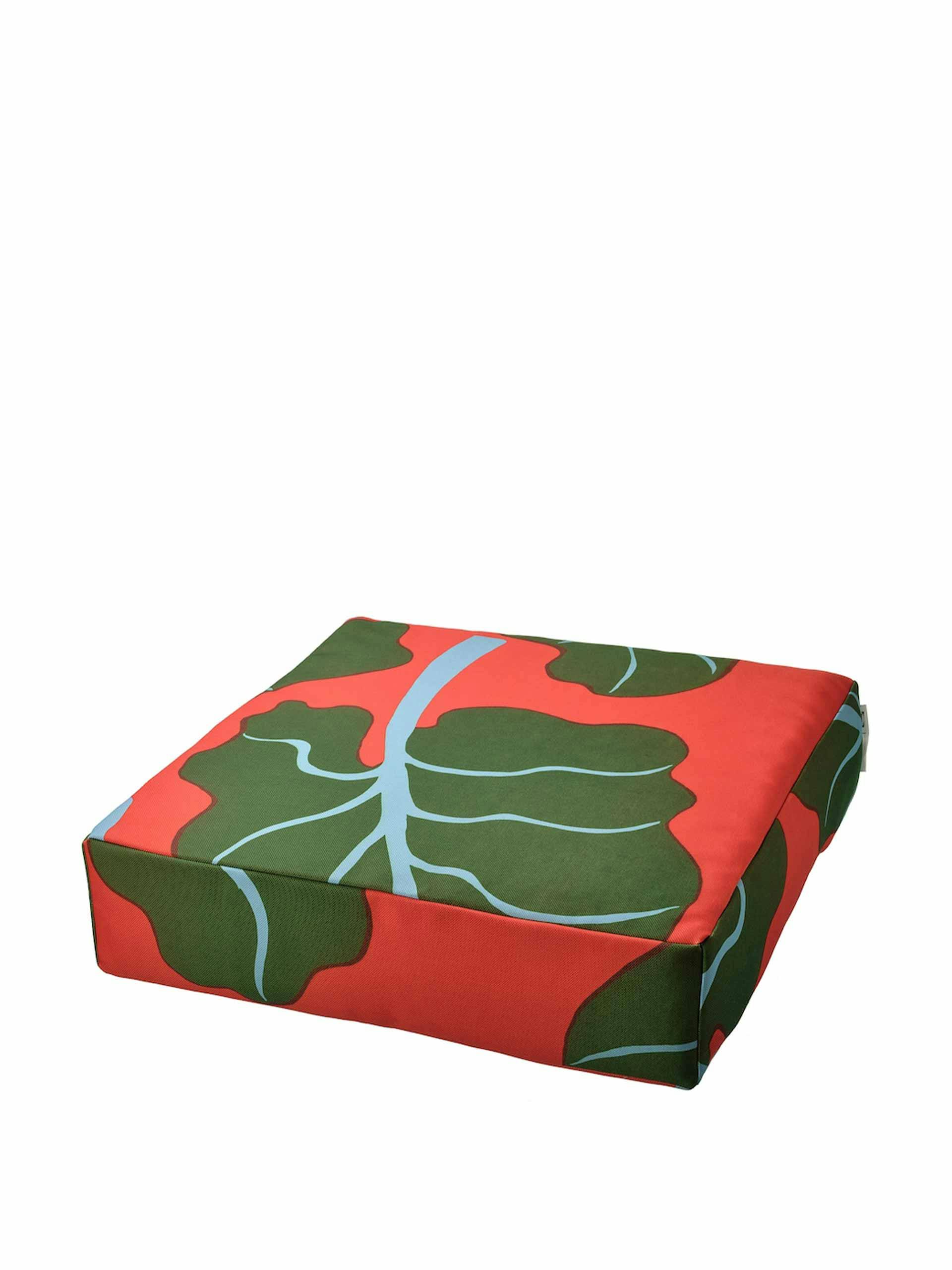 Red and green floor cushion