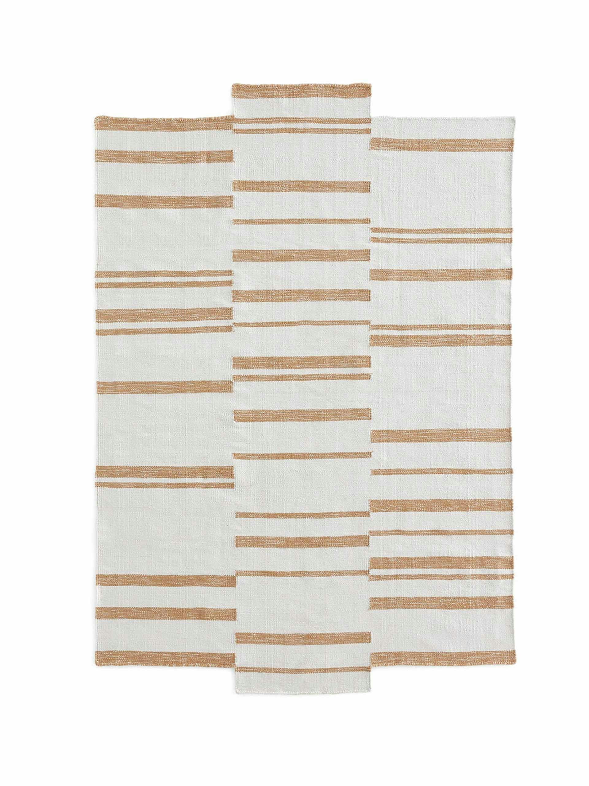 Offset striped outdoor rug