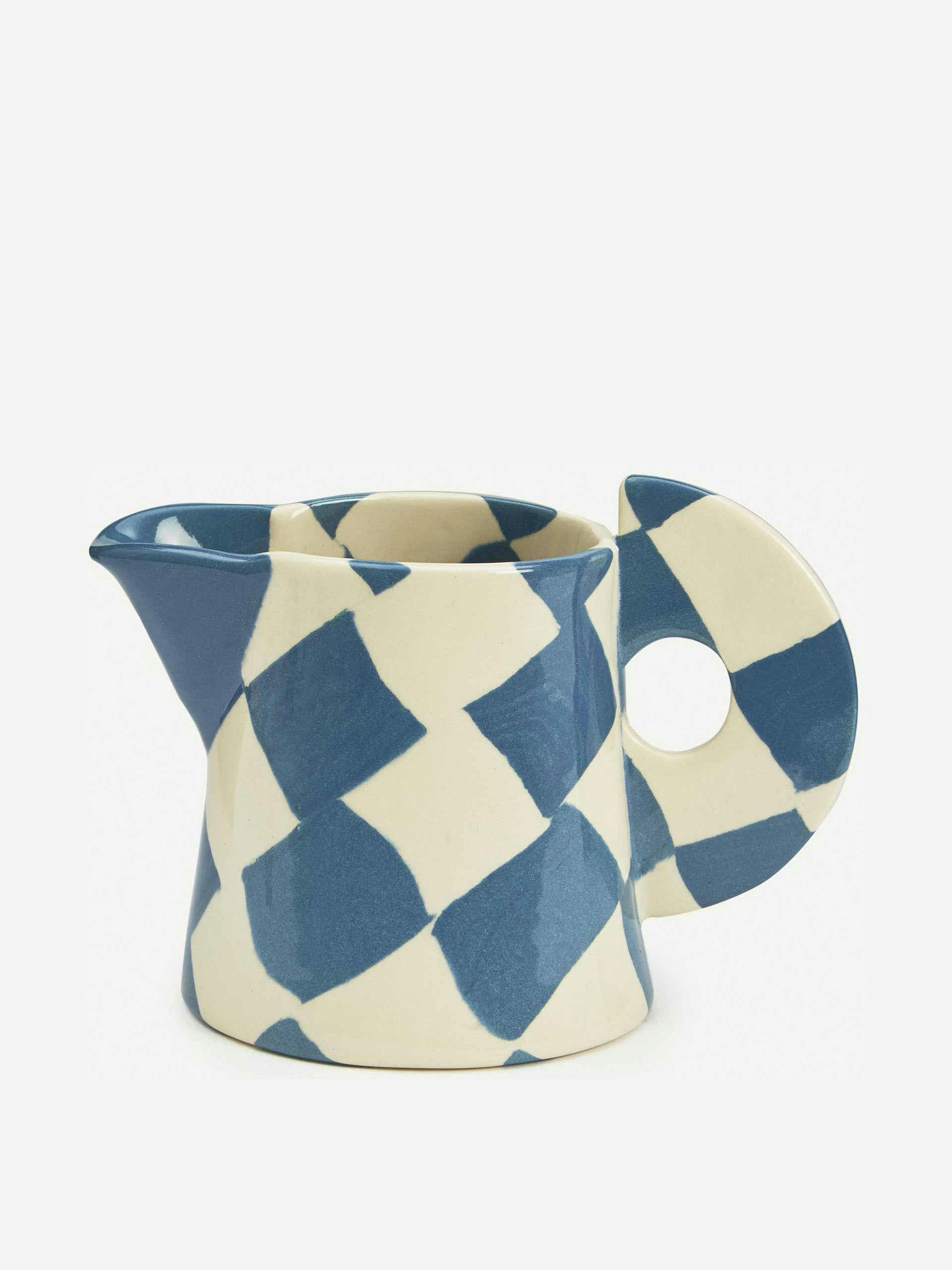 Blue and white small checkerboard milk jug