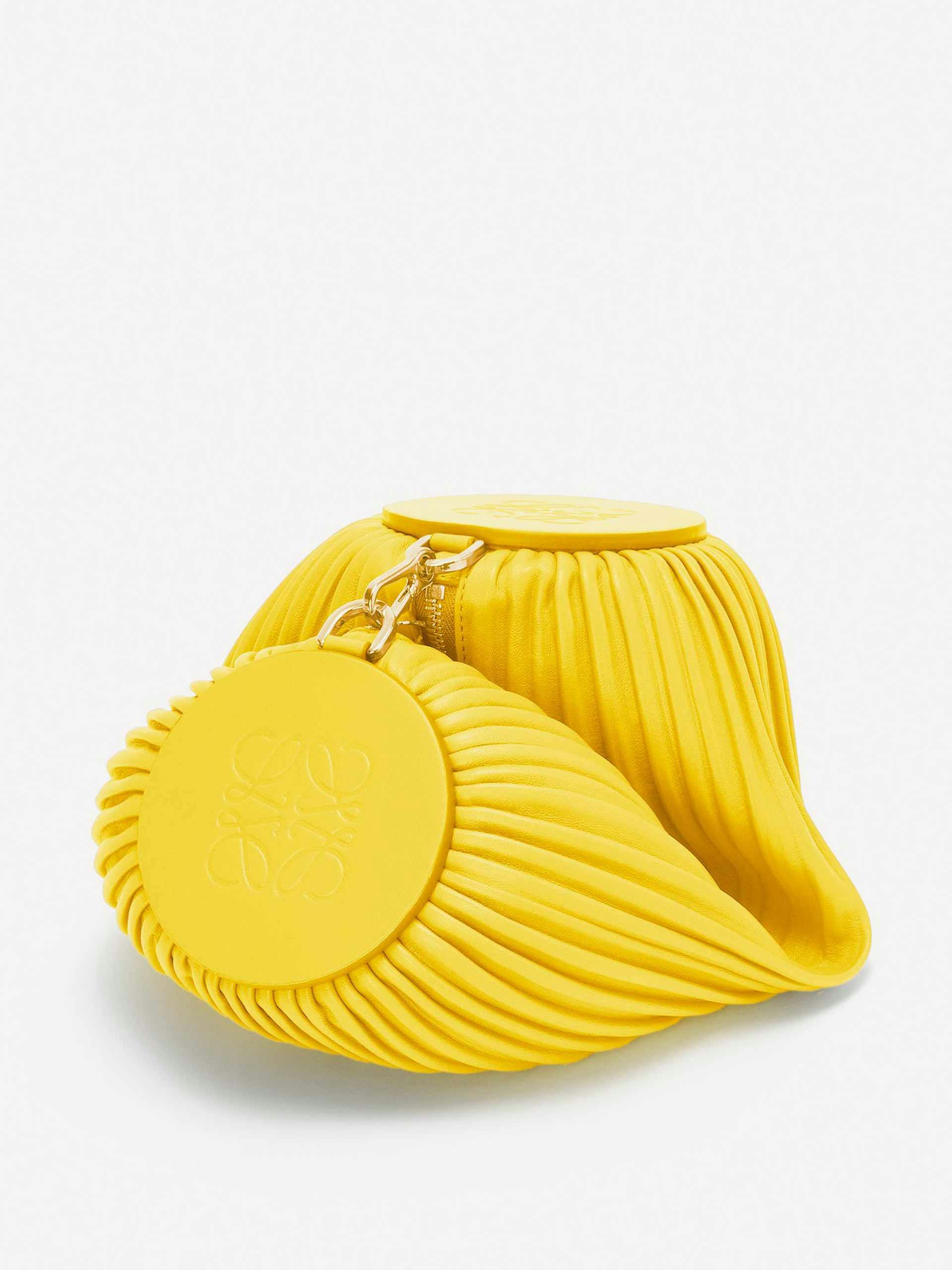 Yellow pleated leather bracelet pouch bag