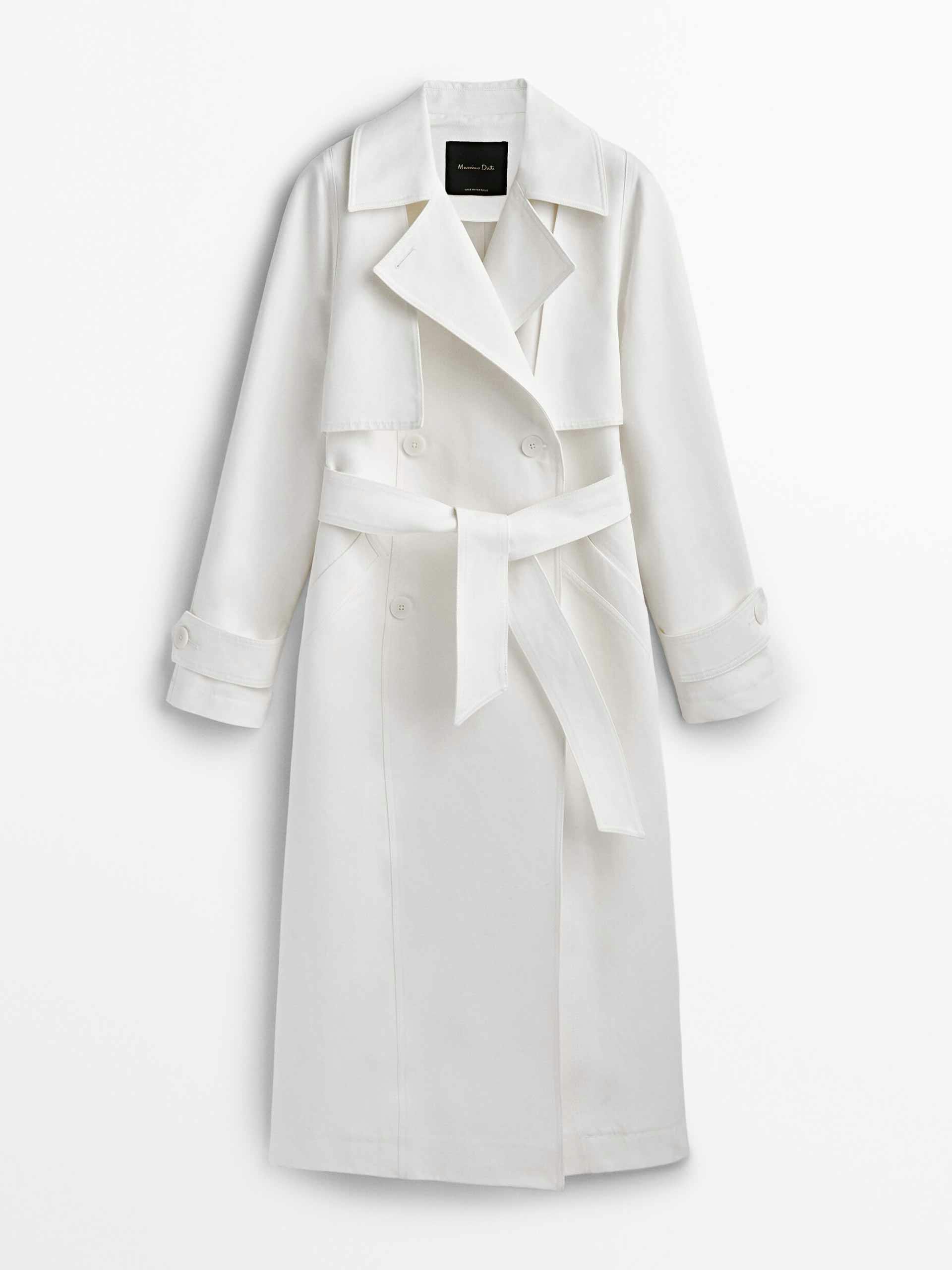 Double-breasted white trench coat