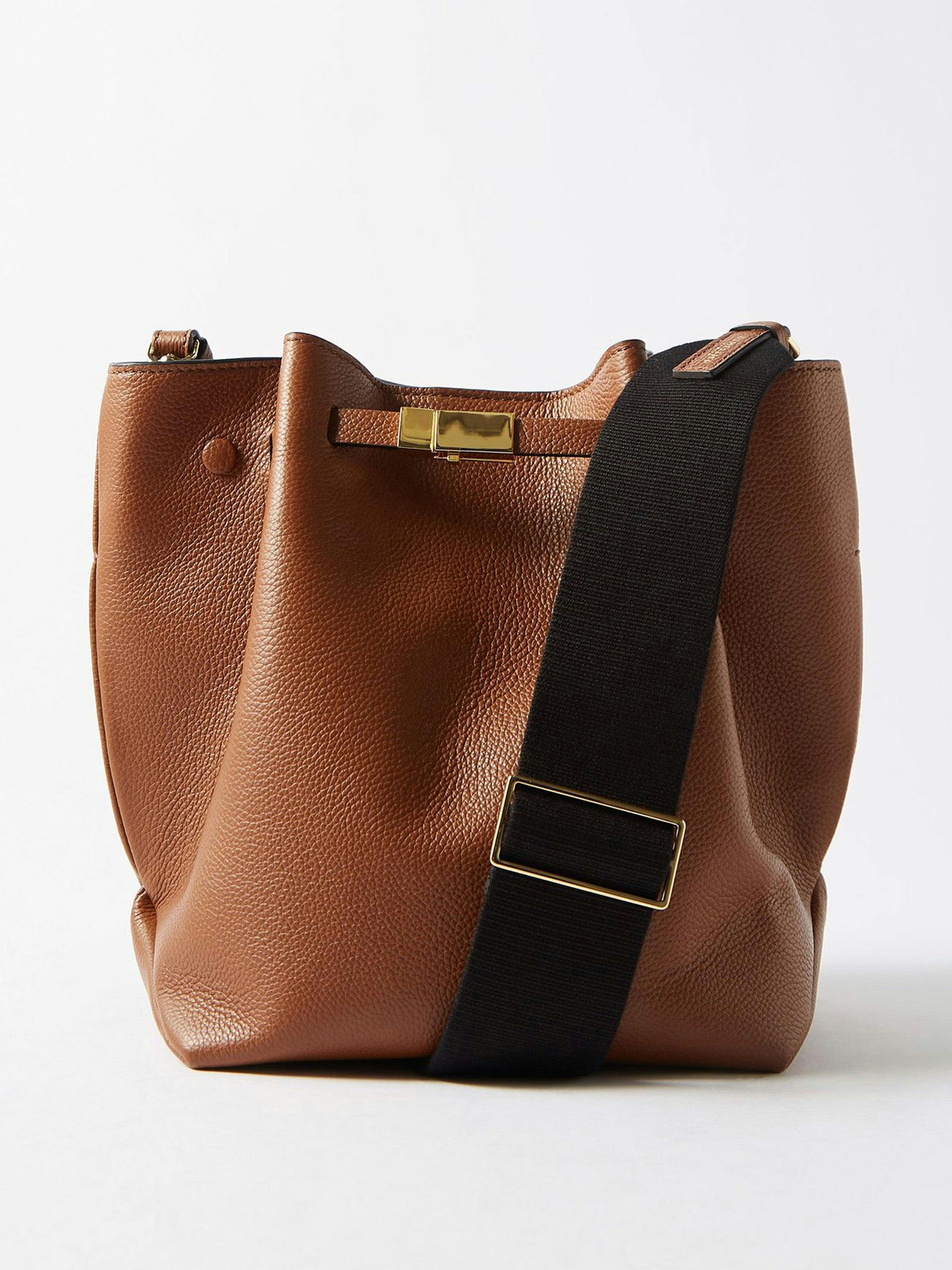 Grained leather bucket bag with detachable web strap