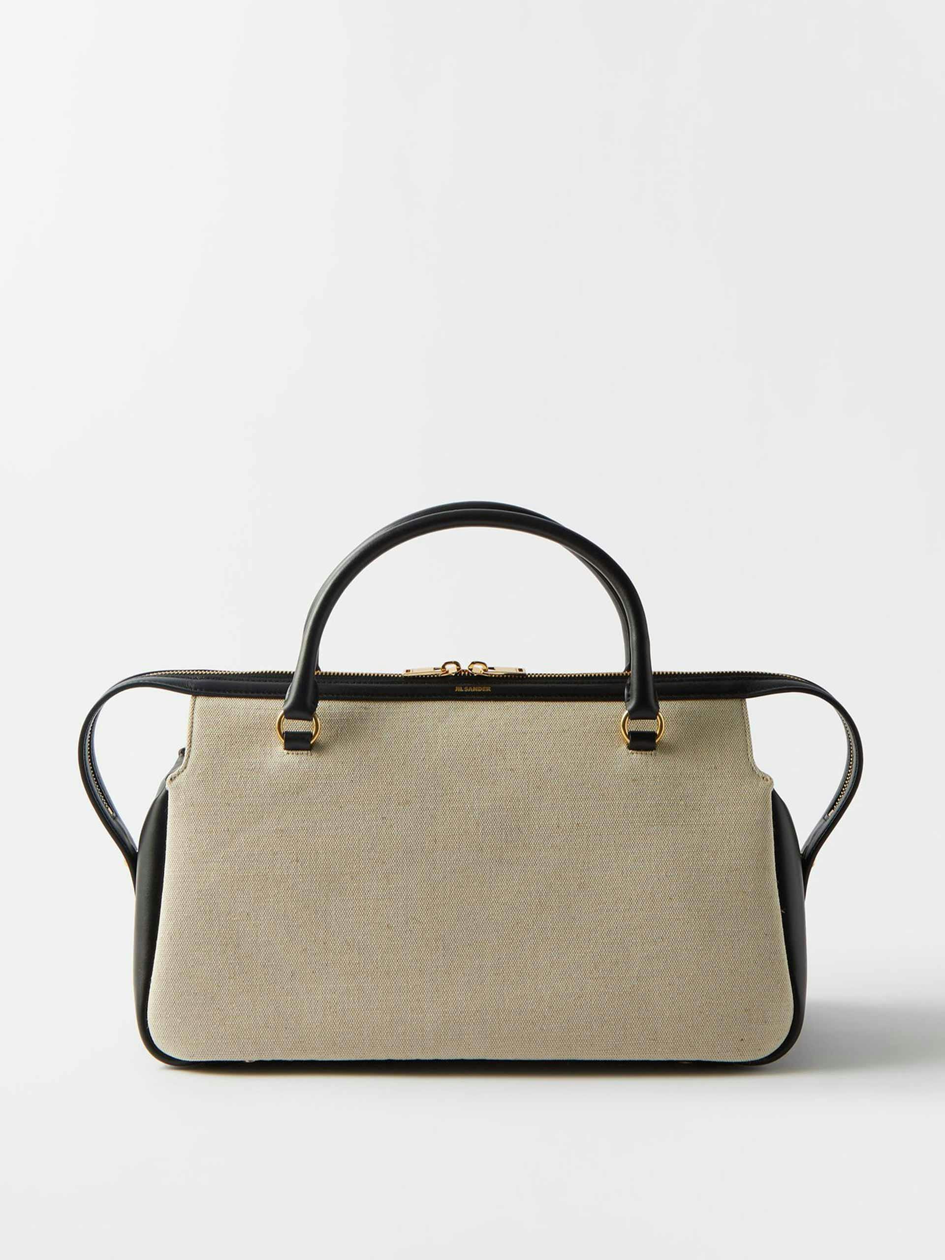 Beige canvas and leather handbag