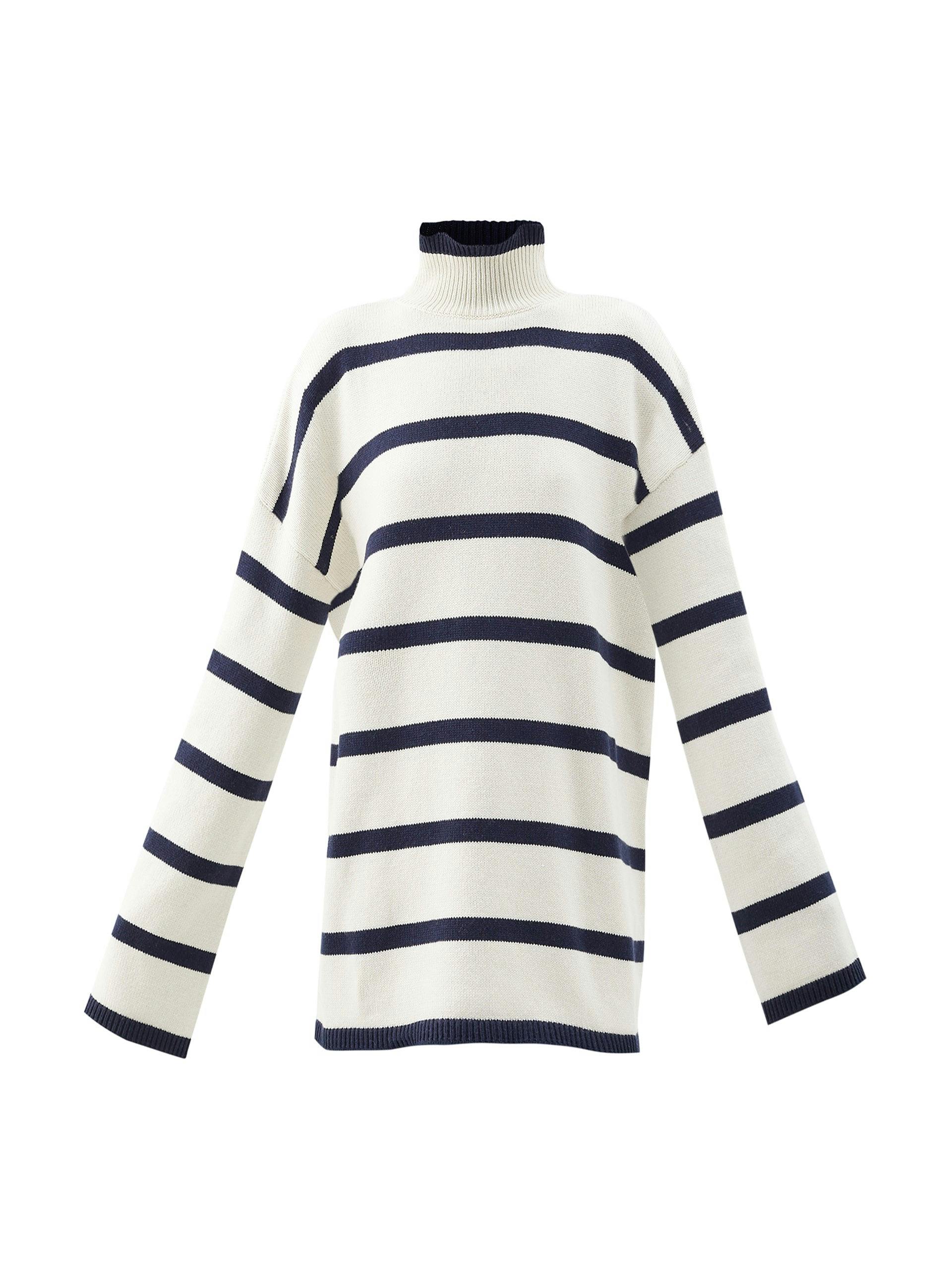 White jumper with blue stripes