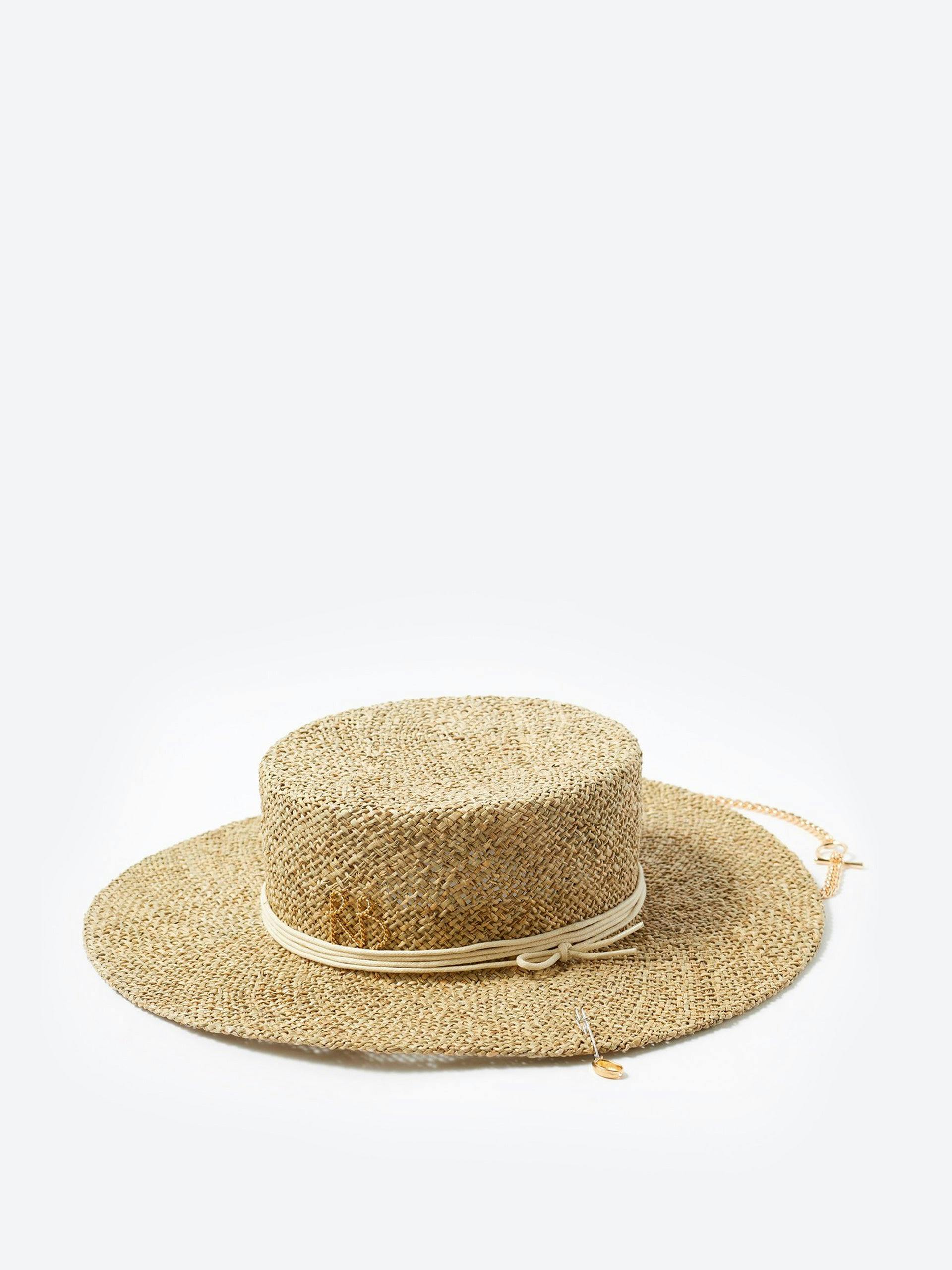 Chain embellished straw hat