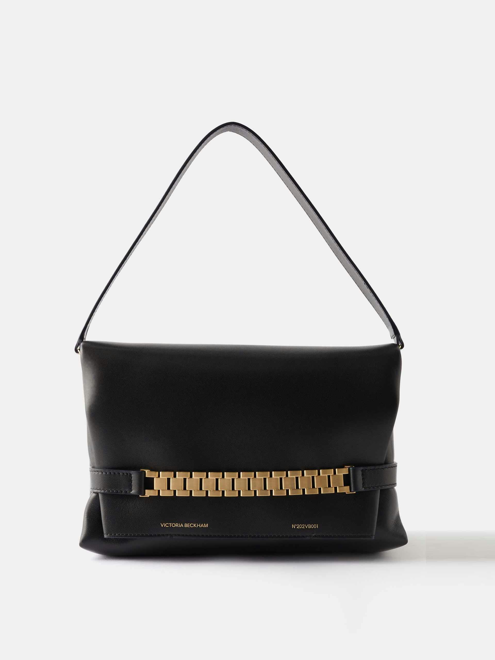 Chain-embellished leather handbag