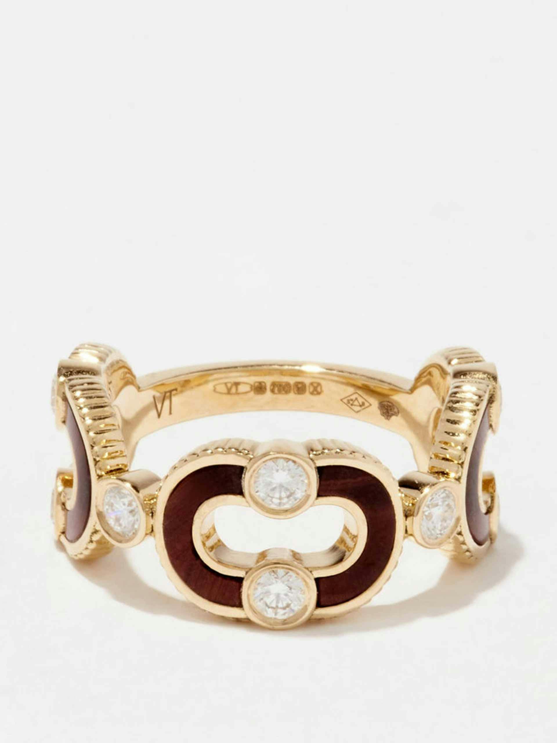 Magnetic Enchainée brown bull's eye and gold ring