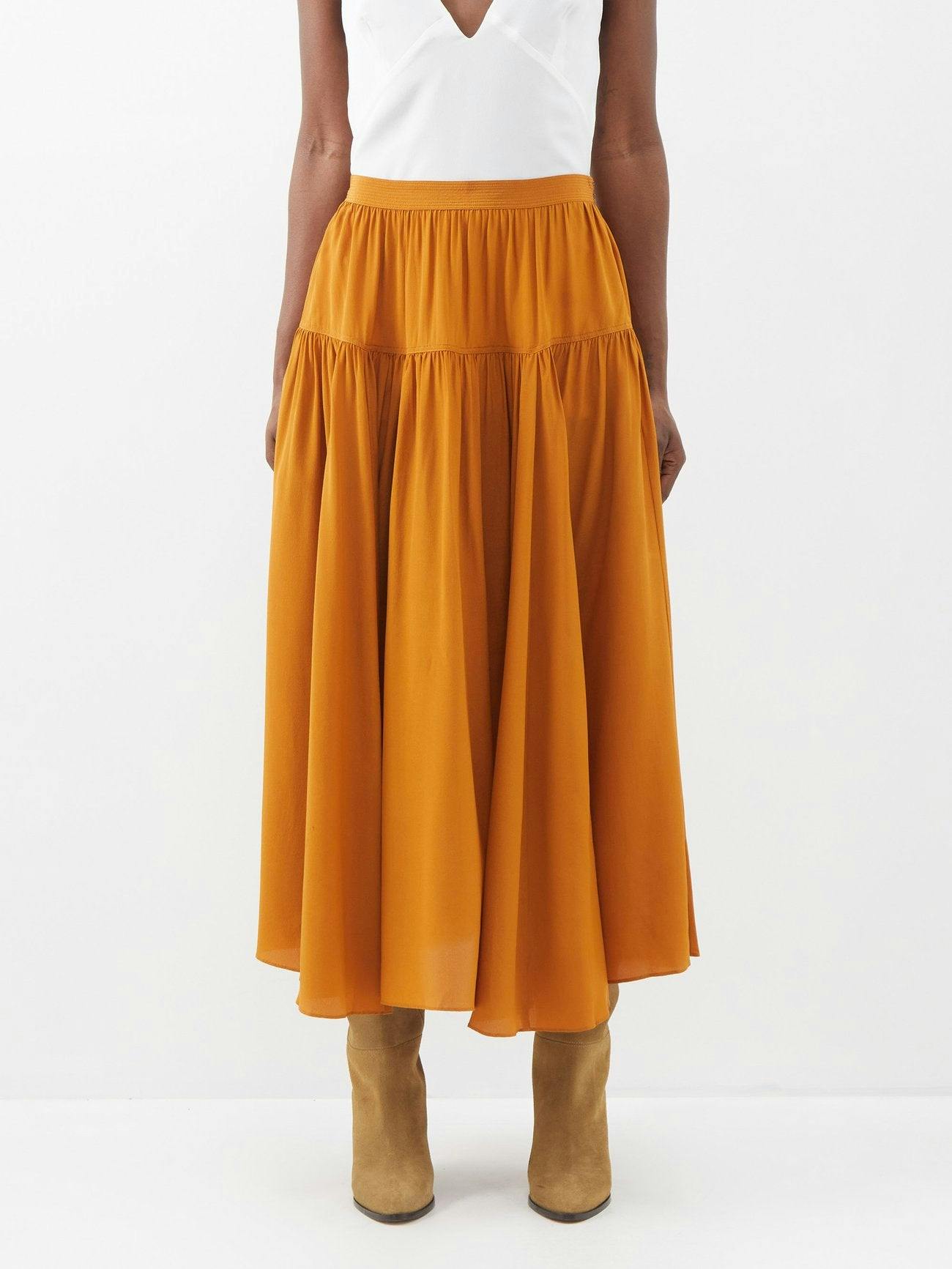 Orange silk pleated midi skirt