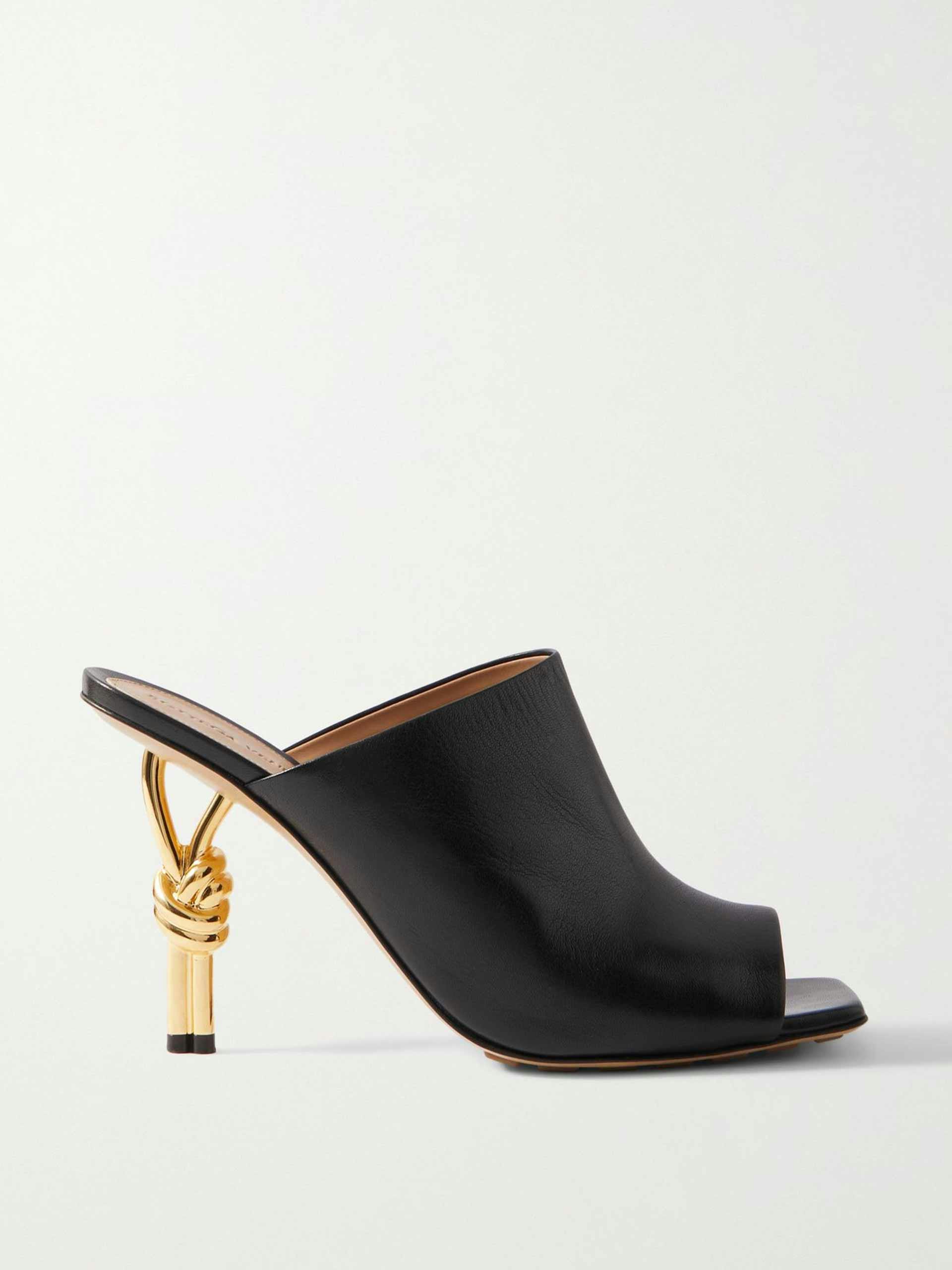Black and gold twisted heels